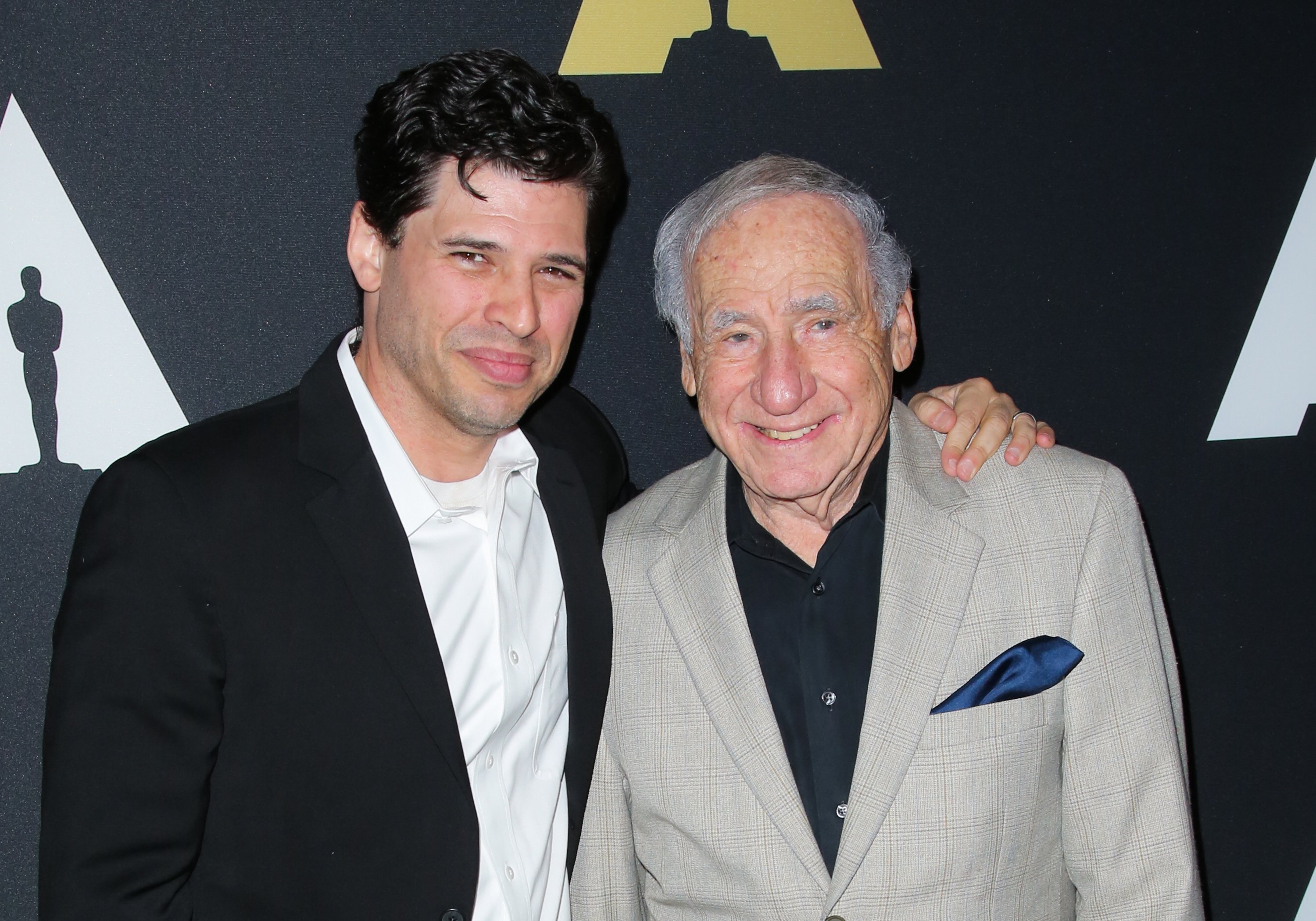 Screenwriter Max Brooks and his father Mel Brooks attend the 20th anniversary screening of "The Shawshank Redemption" at the AMPAS Samuel Goldwyn Theater on November 18, 2014 in Beverly Hills, California ┃Source: Getty Images