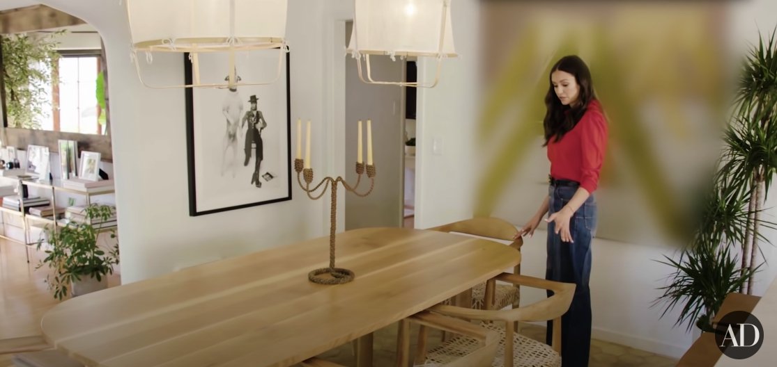 Nina Dobrev showing off her house's dining room to Architectural Digest on October 1, 2021 | Photo: YouTube.com/Architectural Digest