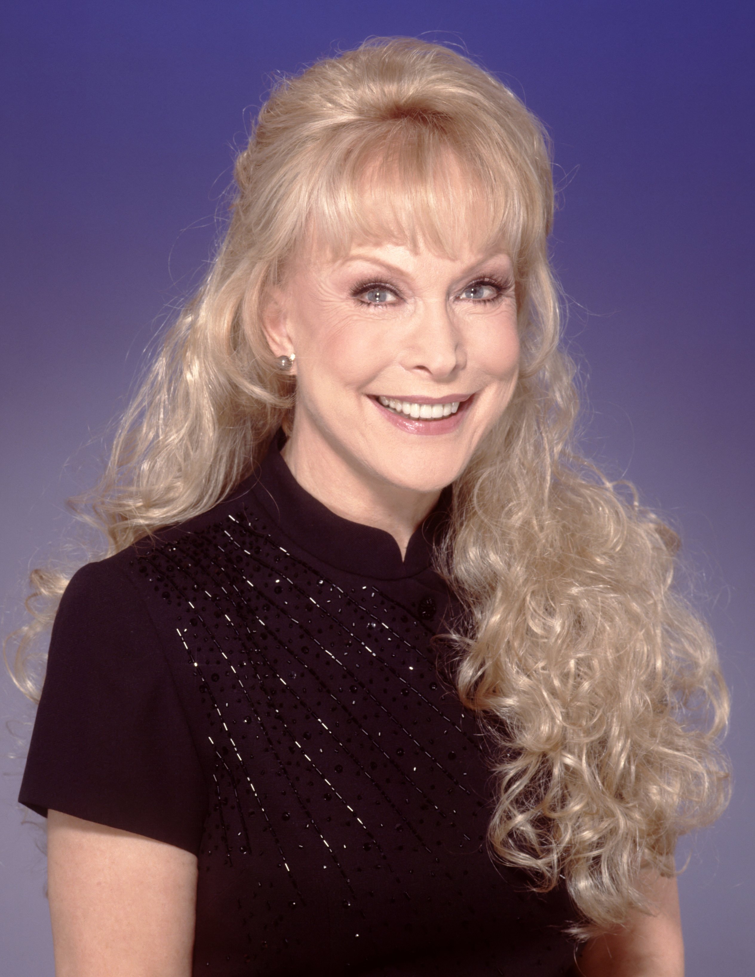 Barbara Eden's portrait features her with long hair in 2000 in Los Angeles, California. | Source: Getty Images