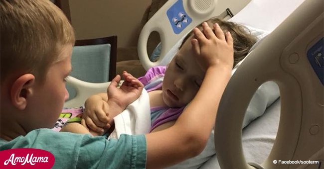 Dad shares heartbreaking photo of boy comforting his dying 4-year-old sister