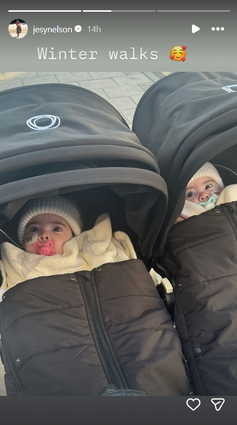 Nearly two weeks on, Ocean Jade and Story Monroe are still going strong — peeking out sweetly from their stroller during a crisp winter walk, bundled in cosy blankets and matching beanies, their nasogastric tubes gently secured in place. | Source: Instagram/jesynelson