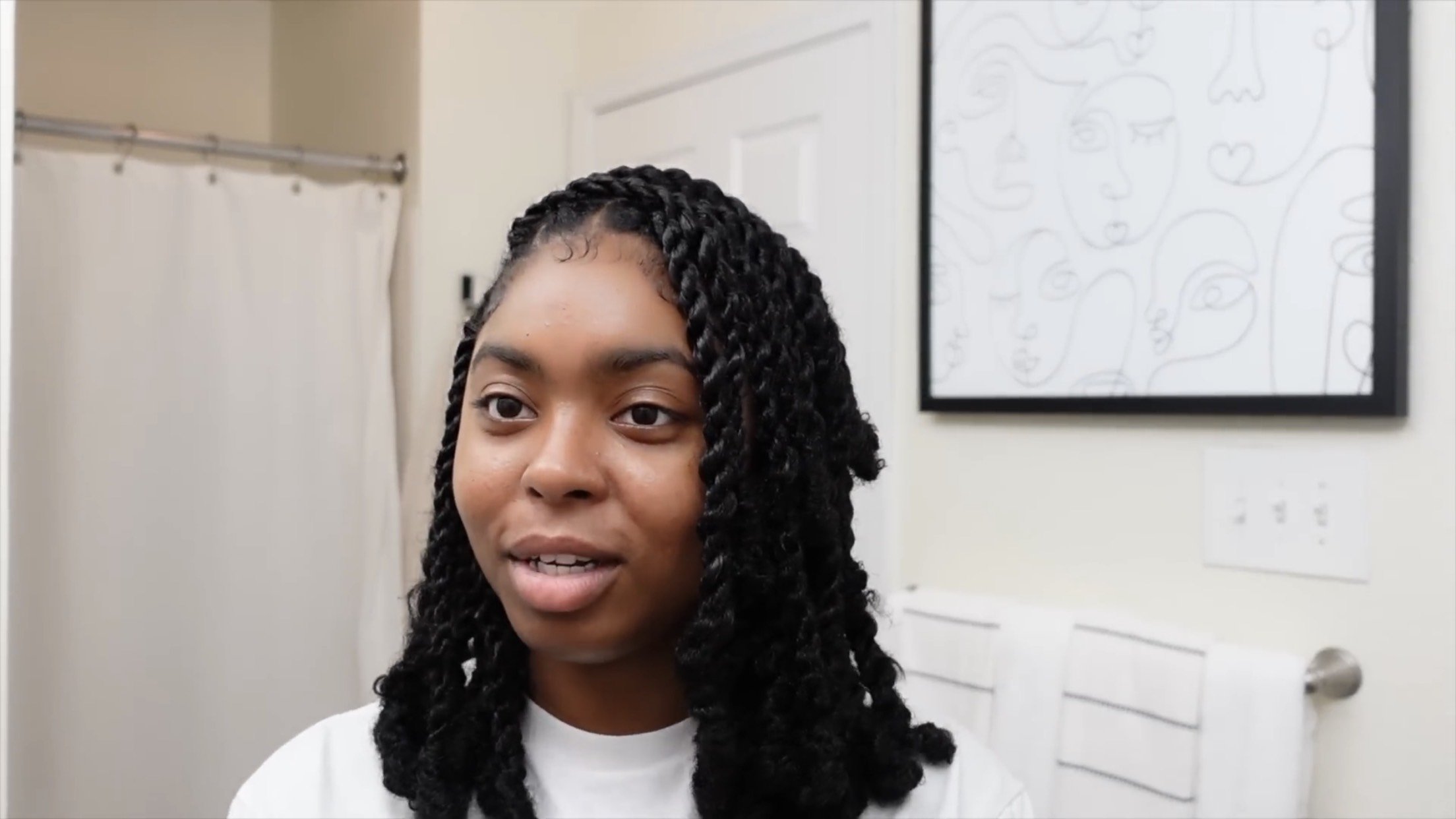 A woman with two-strand twists | Source: YouTube/ Jateraa Bria'Na