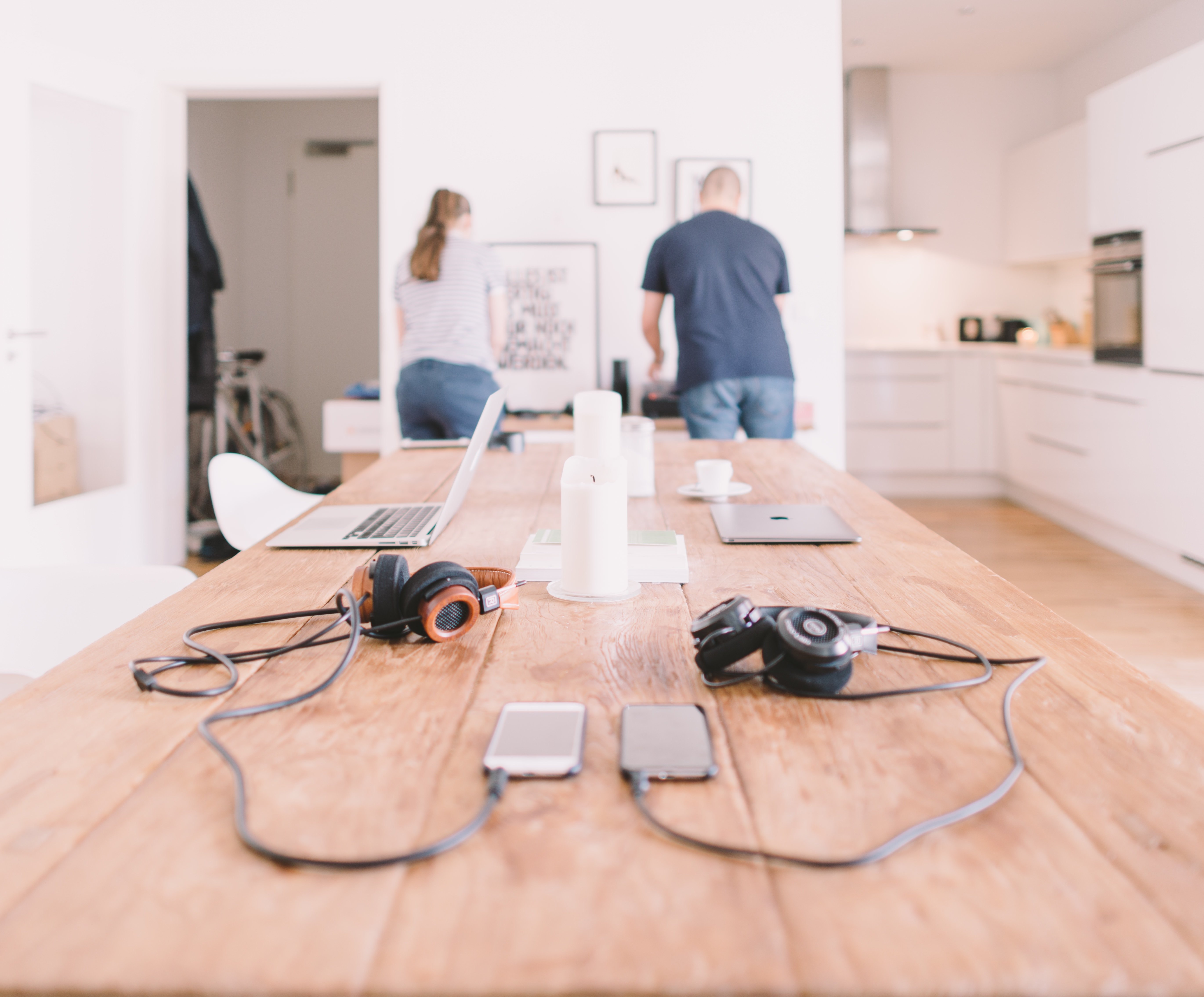 Two people working at the end of a room | Source: Unsplash