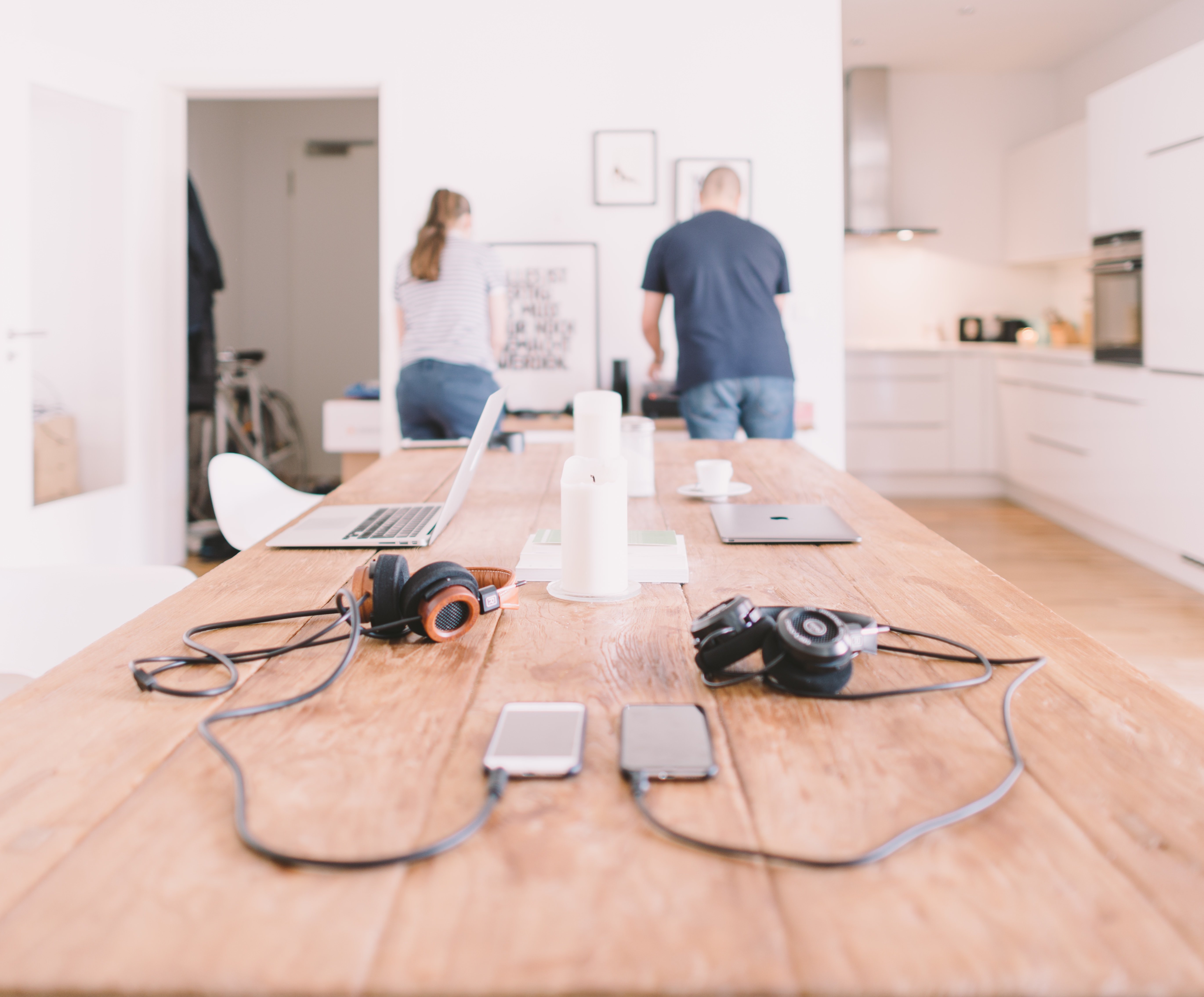 Two people working at the end of a room | Source: Unsplash.com