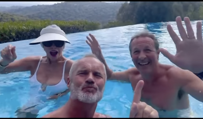 Joan Collins and her husband, Percy Gibson and friend Paul Robinson dancing in the pool, dated July 16, 2024 | Source: Instagram/joancollinsdbe