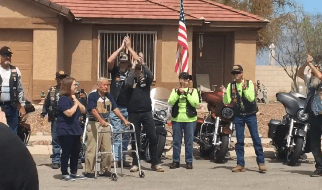 World War II veteran Jennings Shelton Jr. holding onto his walker | Photo: Facebook/Denelle Confair TV