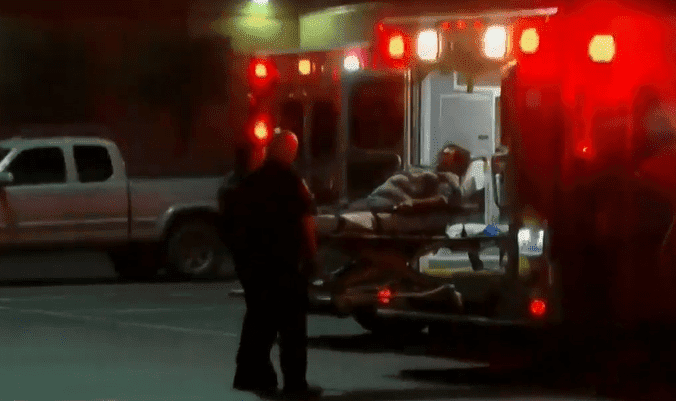 One of the victims being taken by paramedics | Photo: CBS Los Angeles