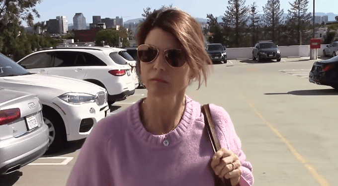 Lori Loughlin spotted by paparazzi in a parking lot | Photo: Entertainment Tonight