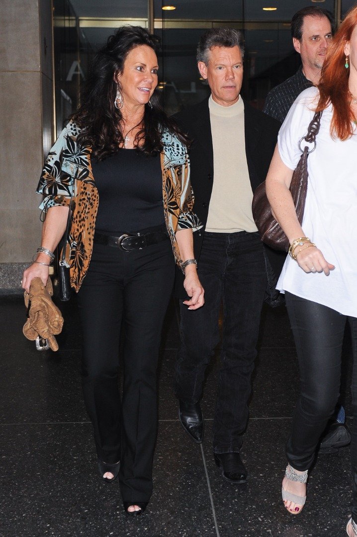 Actor and singer Randy Travis and Mary Beougher leave the "Good Morning America" taping at the ABC Times Square Studios on March 21, 2012 in New York City. | Source: Getty Images