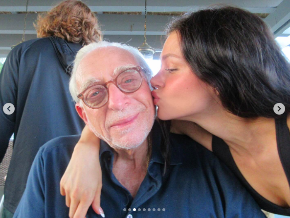 Nicola Peltz kissing her dad, Nelson Peltz, on the cheek, posted on June 30, 2025. | Source: Instagram/nicolaannepeltzbeckham