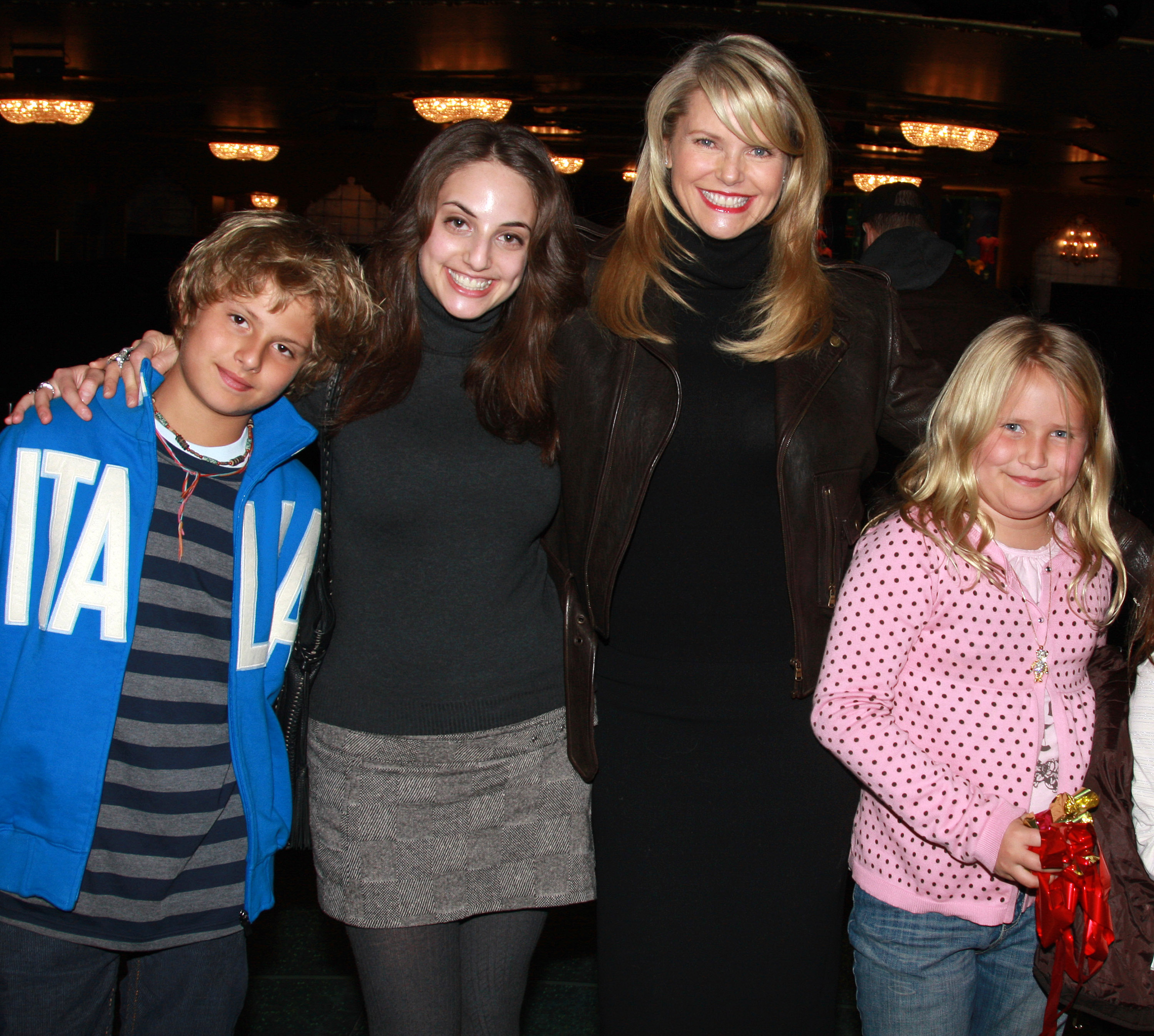 Christie Brinkley poses Jack Cook, Alexa Ray Joel, and Sailor Cook as they visit backstage at "The Little Mermaid" on Broadway in New York City, on January 5, 2008. | Source: Getty Images