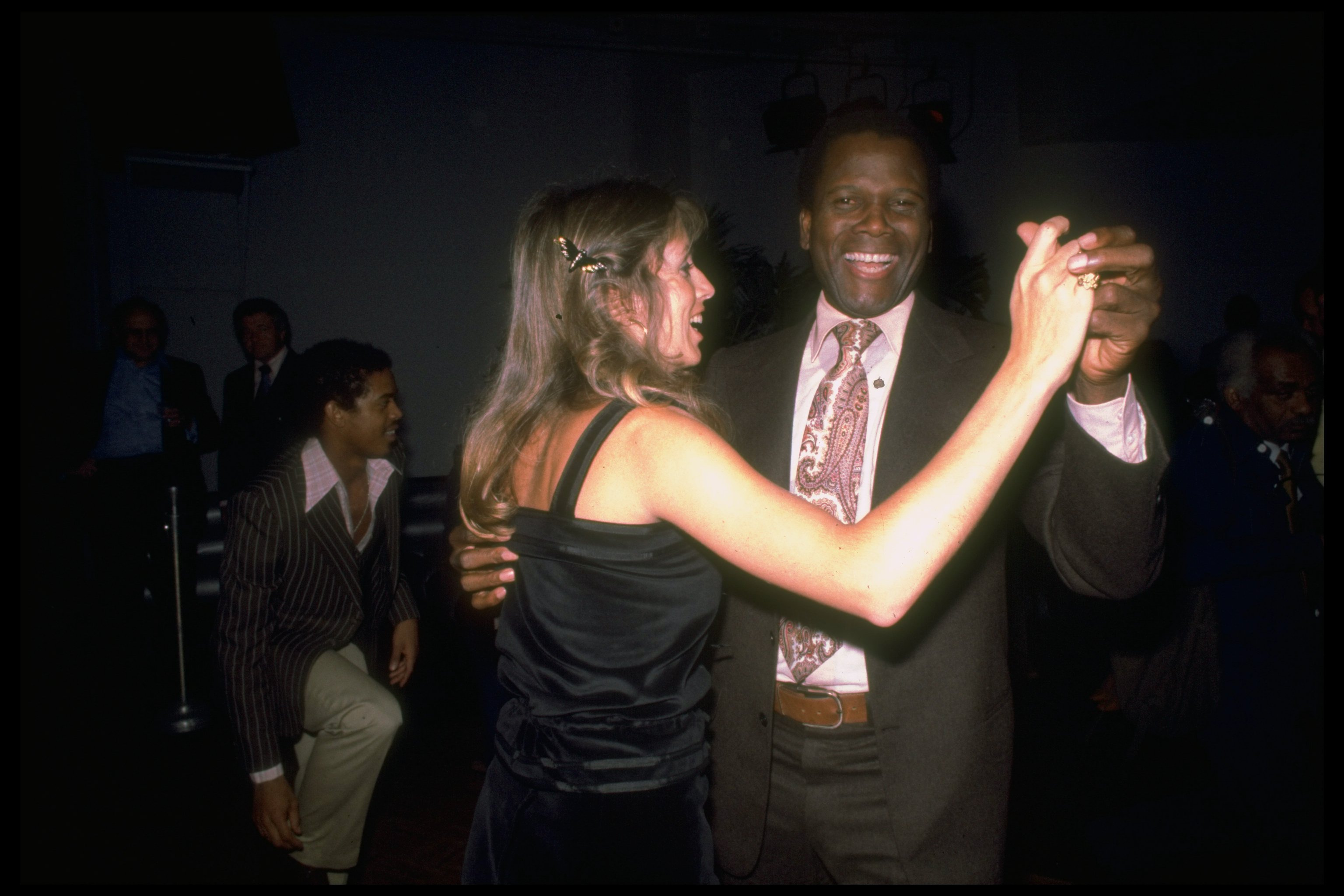 Sidney Poitier dancing with wife Joanna Shimkus at Studio 54 circa 1979 | Source: Getty Images