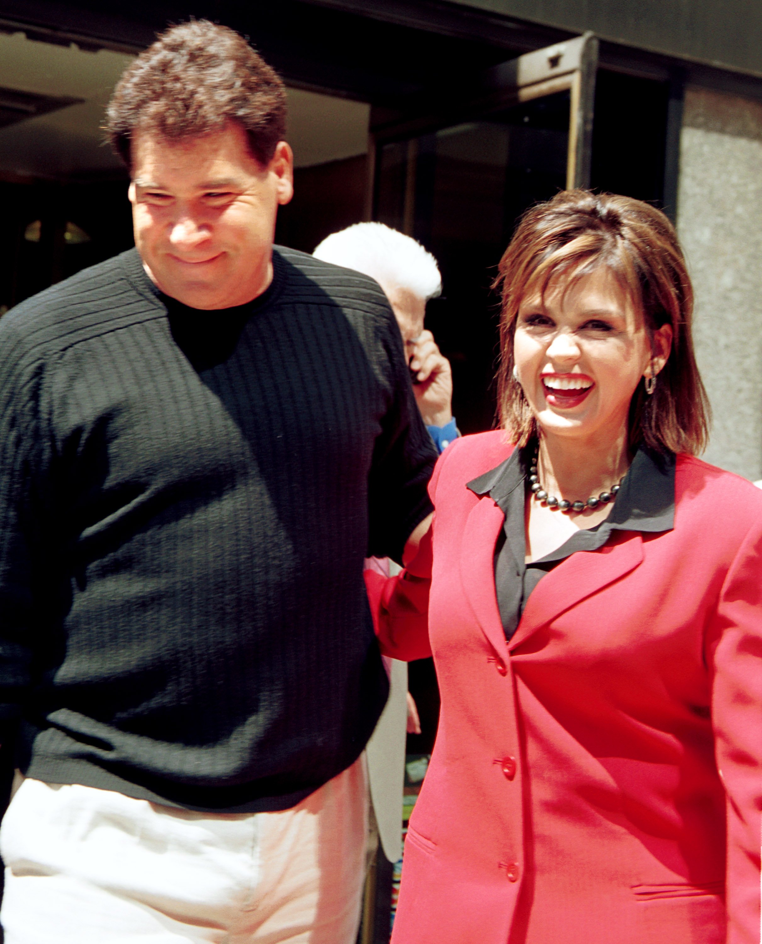 Brian Blosil and Marie Osmond leave a book signing for her new book "Behind the Smile" on May 1, 2001, in New York City | Source: Getty Images