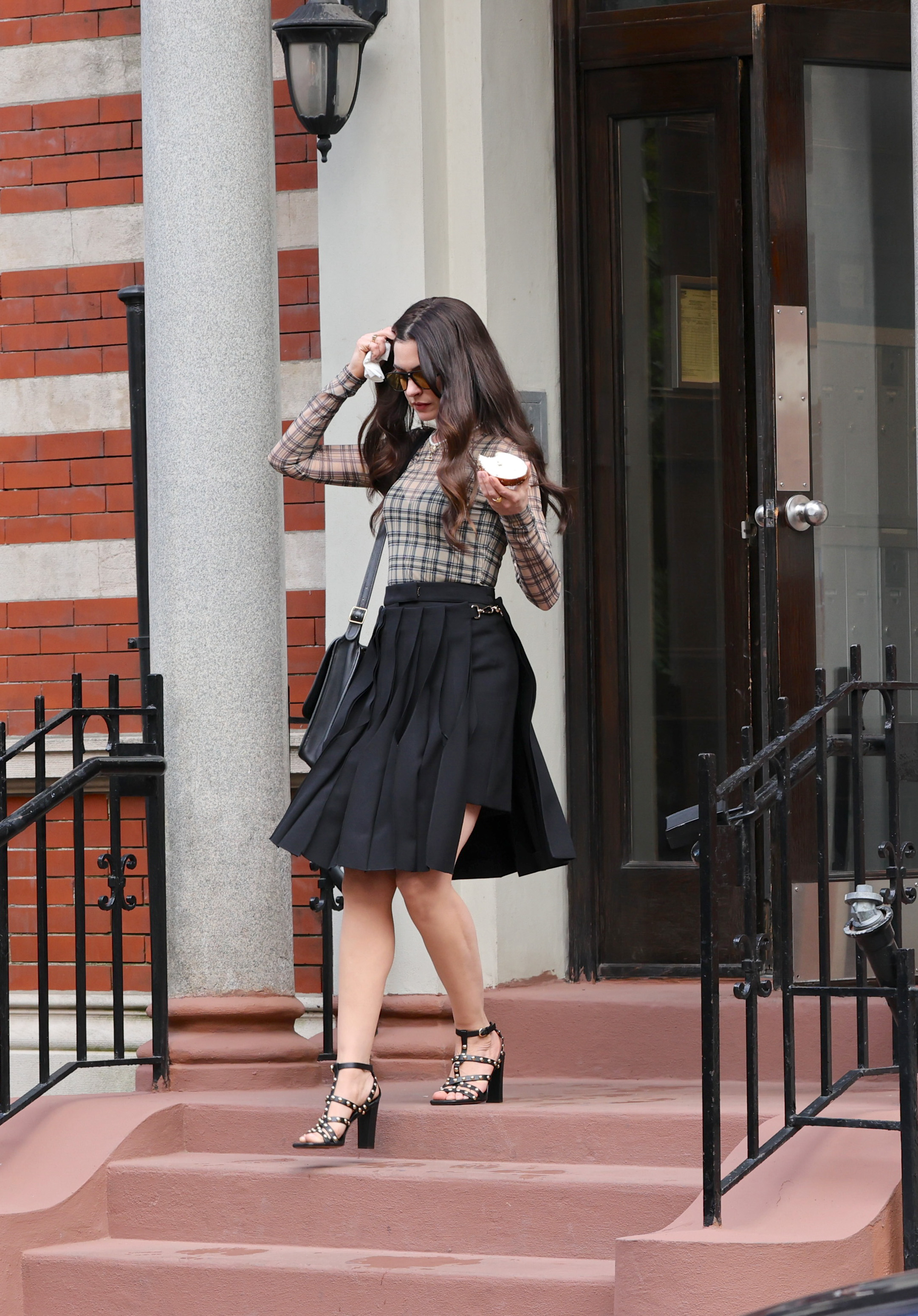 Anne Hathaway is seen on the set of "The Devil Wears Prada 2" on August 27, 2025 in New York City | Source: Getty Images