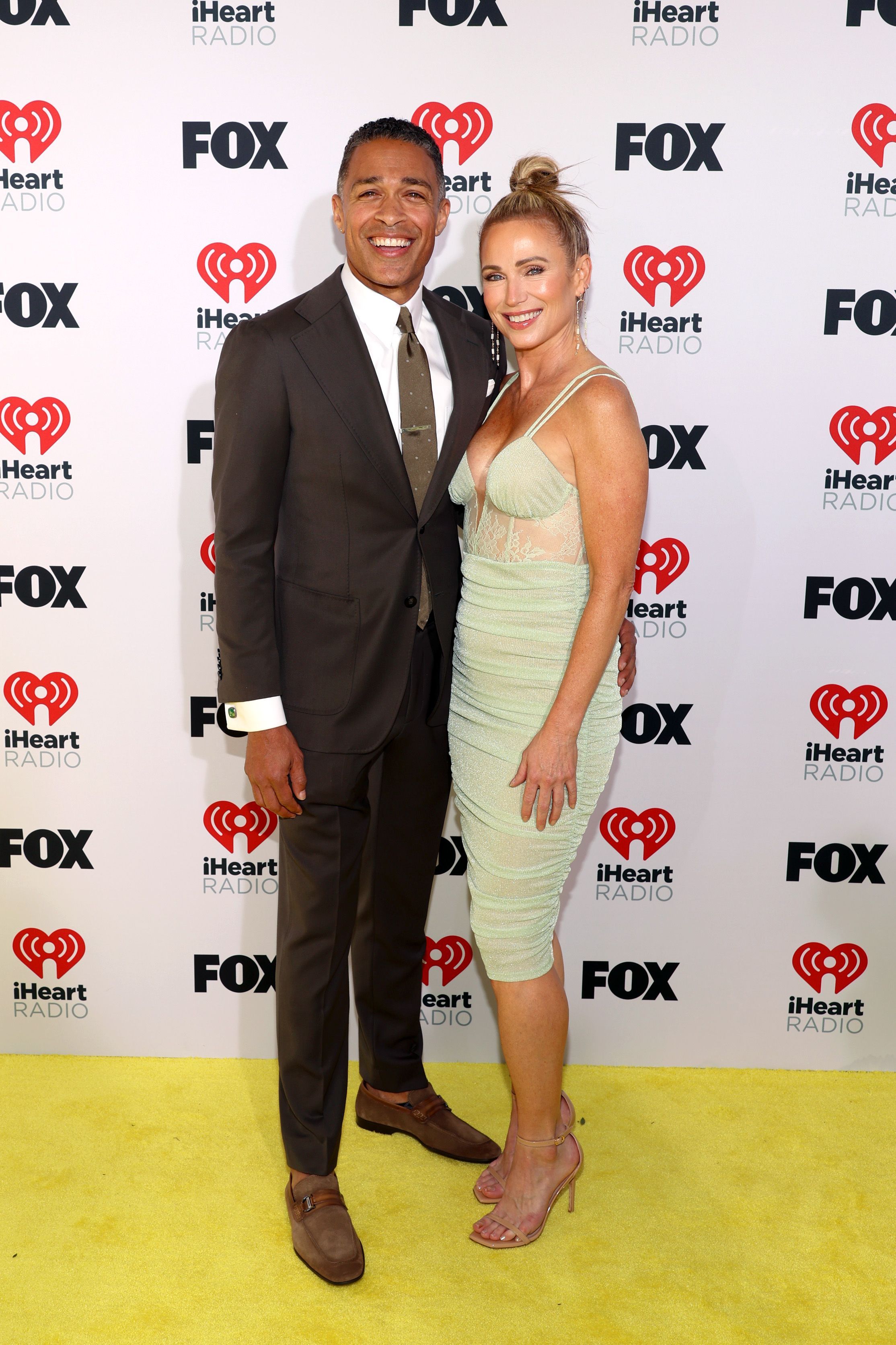 T.J. Holmes and Amy Robach at the 2024 iHeart Radio Music Awards on April 1, 2024 | Source: Getty Images