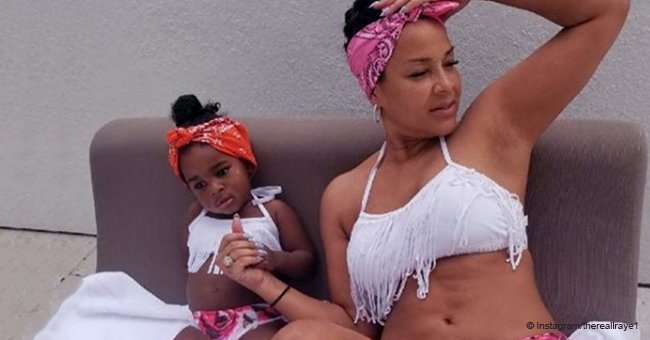 LisaRaye McCoy goes twinning with her adorable granddaughter in floral swimsuits in pics