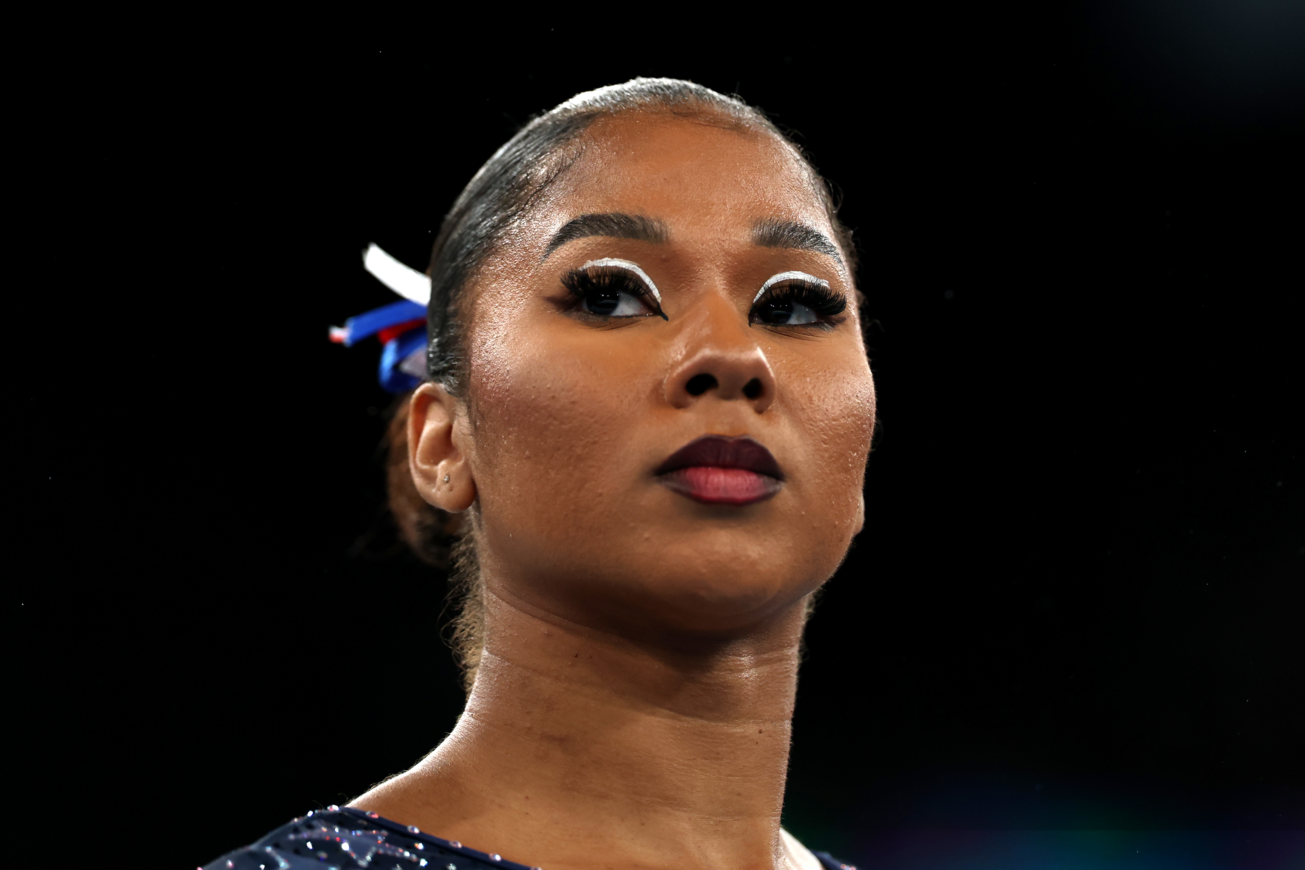 Jordan Chiles prepares for the uneven bars during the Women's Team Final at the 2024 Paris Olympics on July 30, 2024 | Source: Getty Images