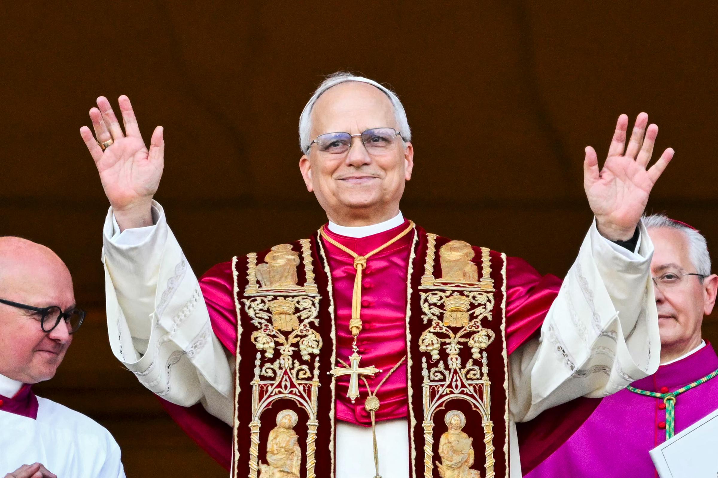 Pope Leo arriving on the main central loggia balcony of the St Peter's Basilica for the first time, after the cardinals ended the conclave in The Vatican on May 8, 2025. | Source: Getty Images