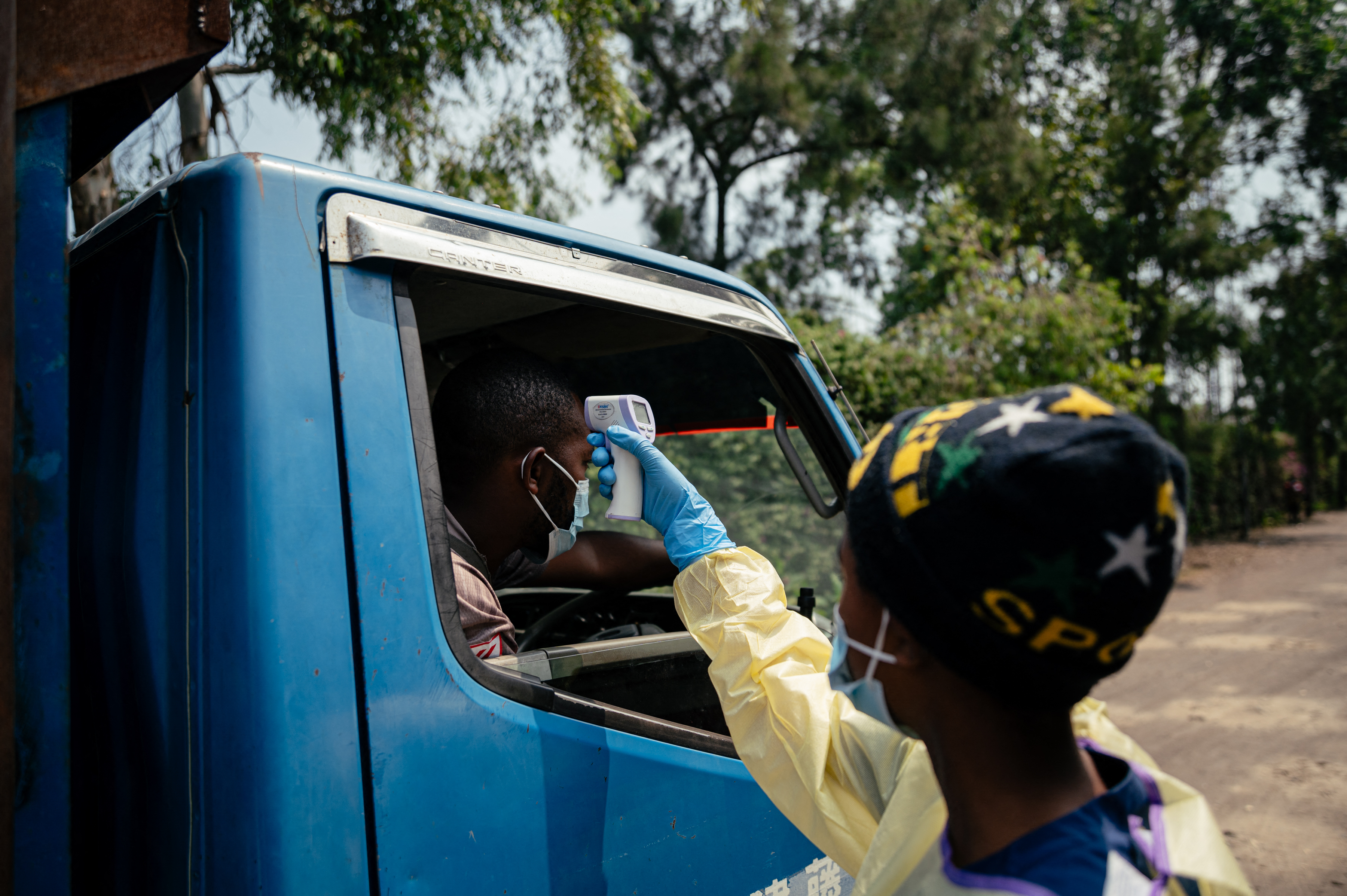 A visitor has their temperature checked by a health worker using a thermoflash before entering Kyeshero Hospital at a checkpoint for temperature screening for all visitors and patients entering Kyeshero Hospital, as part of Ebola prevention measures in Goma on May 18, 2026. | Source: Getty Images