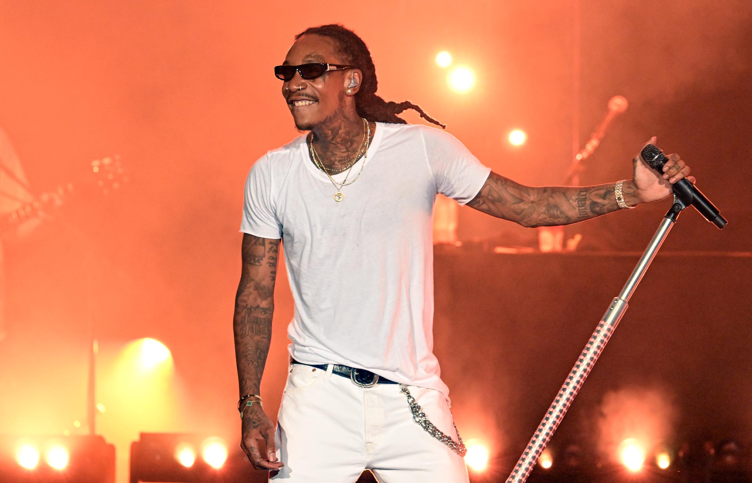 Wiz Khalifa onstage during the "Good Vibes Only" tour at Lakewood Amphitheatre on July 27, 2025, in Atlanta, Georgia. | Source: Getty Images