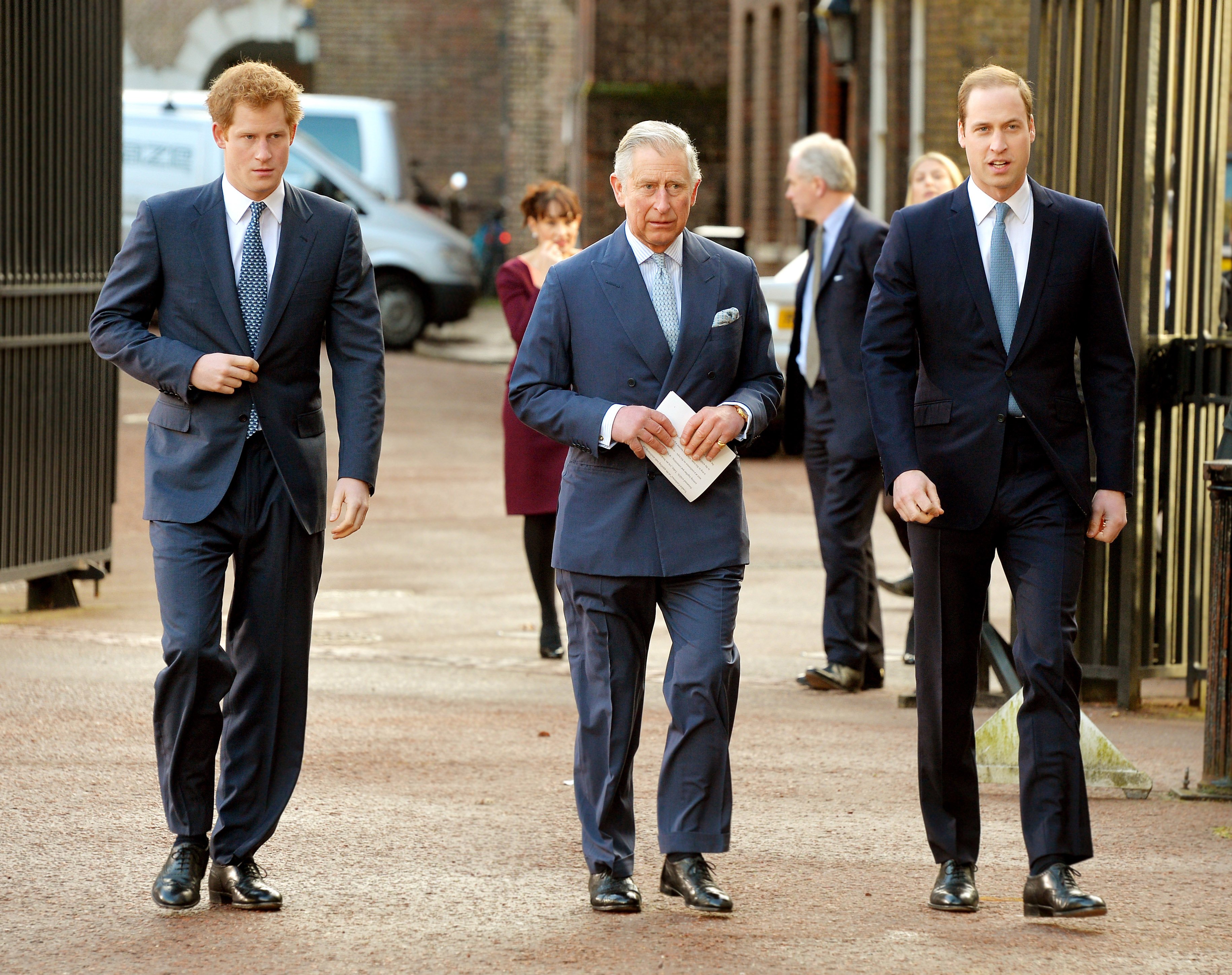 Prince Harry, Prince Charles, Prince of Wales and Prince William, Duke of Cambridge arrive at the Illegal Wildlife Trade Conference on February 13, 2014 in London, England. | Source: Getty Images 