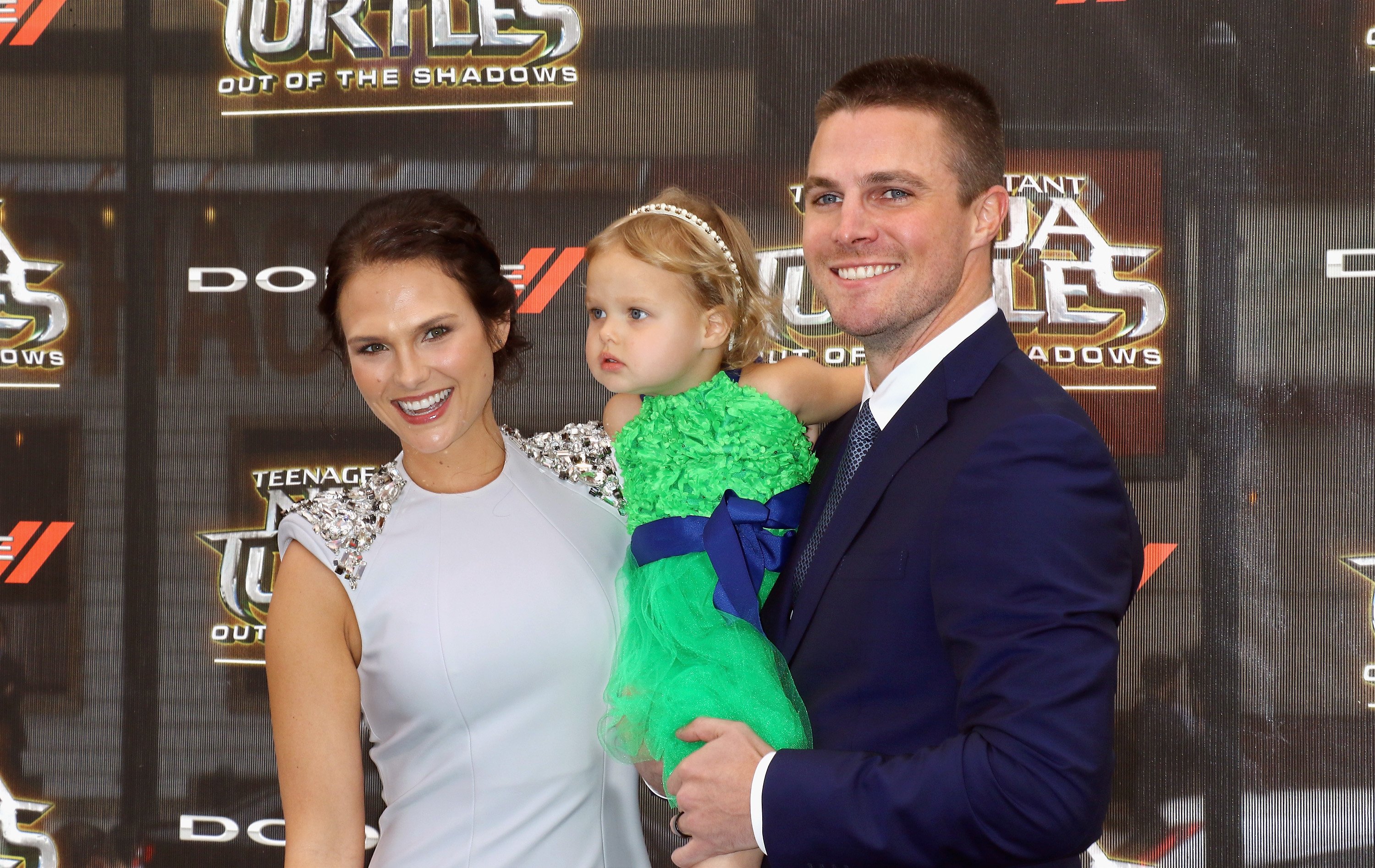 Actress Cassandra Jean, actor Stephen Amell and daughter Mavireck Alexandra Jean Amell attend the "Teenage Mutant Ninja Turtles: Out Of The Shadows" world premiere at Madison Square Garden on May 22, 2016 in New York City. | Source: Getty Images