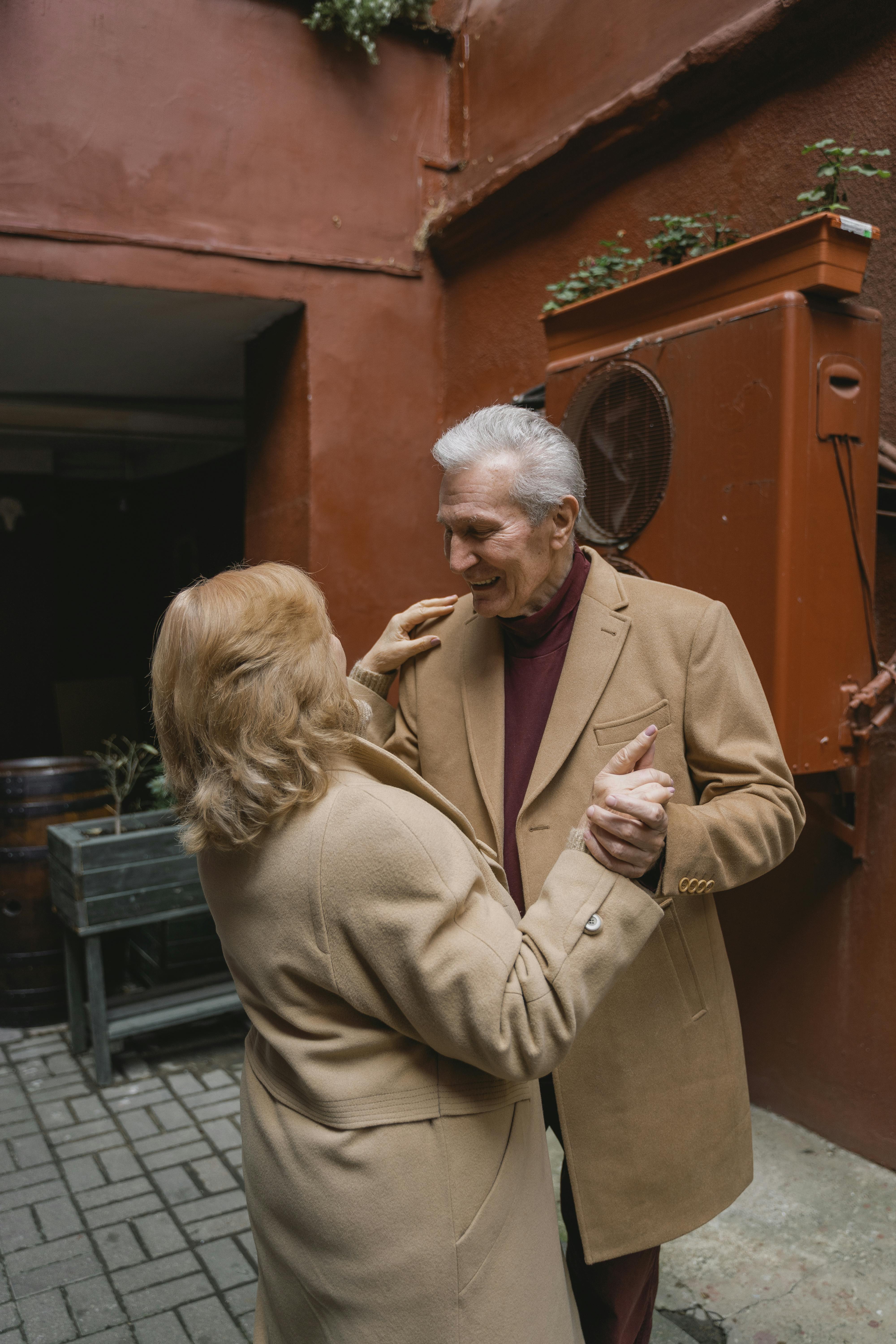 A happy couple dancing | Source: Pexels