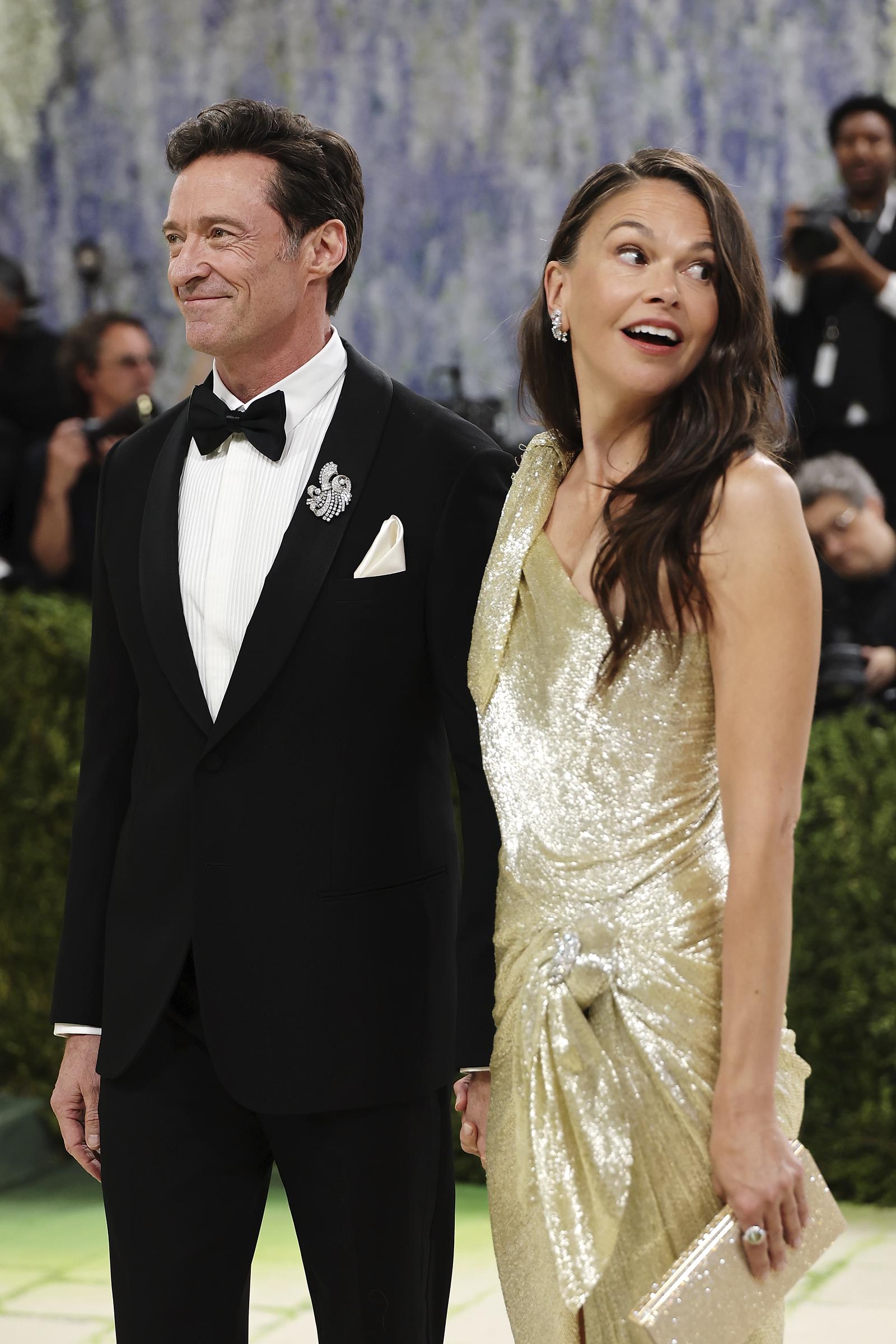 Hugh Jackman and Sutton Foster take photo at the 2026 Met Gala celebrating "Costume Art" at the Metropolitan Museum of Art in New York City. | Source: Getty Images