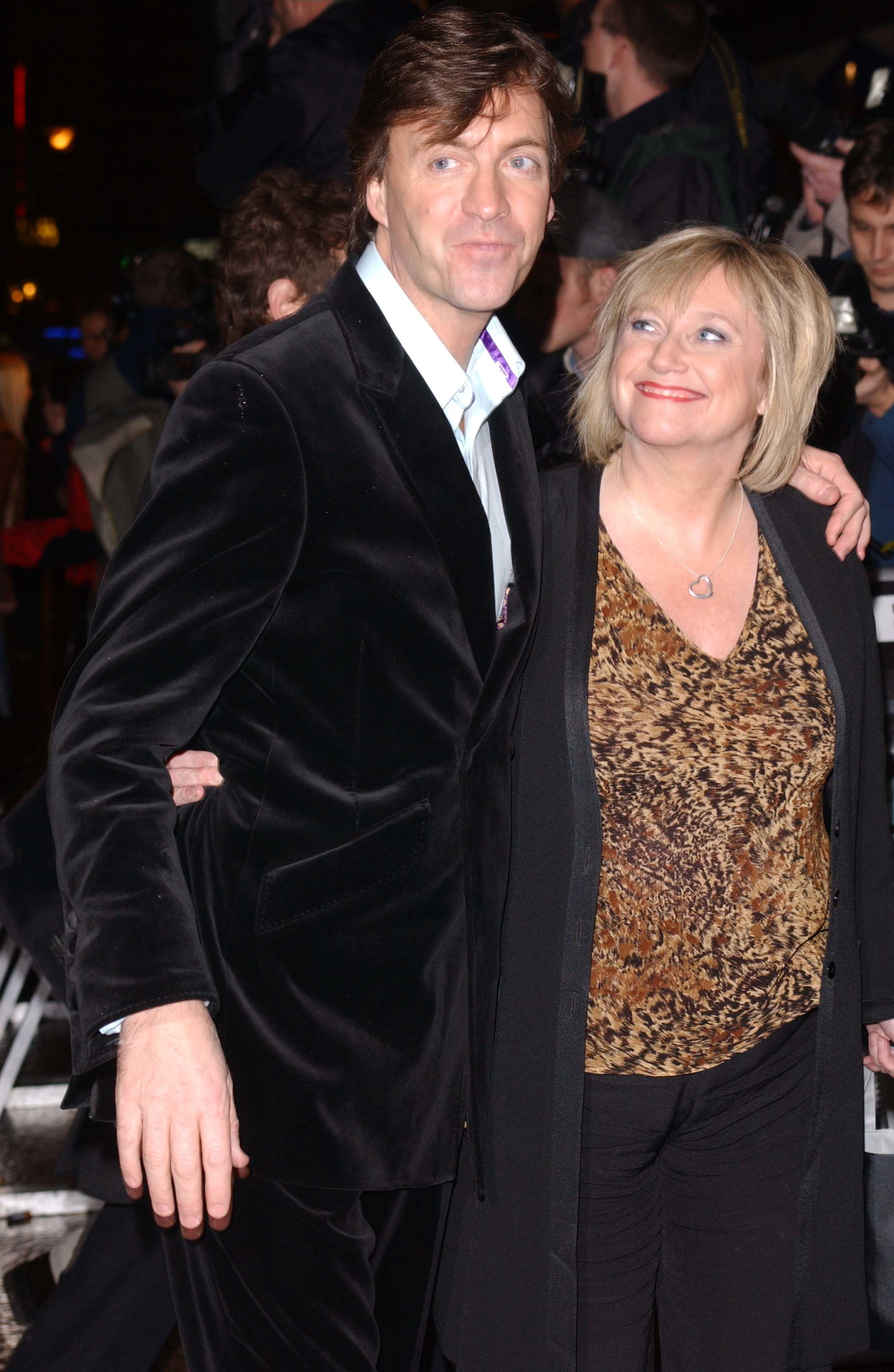 Judy Finnigan and Richard Madeley are photographed at the London premiere of "Ali G Indahouse" on 21 March 2002, their relaxed yet stylish appearance reflecting a period of transition as they embraced new ventures while remaining firmly in the public eye.