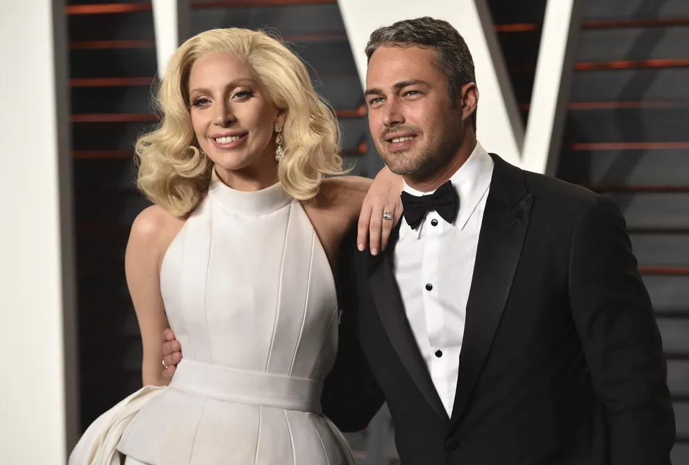 Taylor Kinney and Lady Gaga on February 28, 2016 in Beverly Hills, California | Source: Getty Images