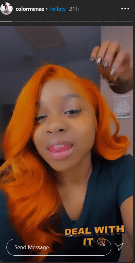 Reginae Carter flaunts her birght orange hair in an Instagram video. | Source: Instagram Stories/colormenae