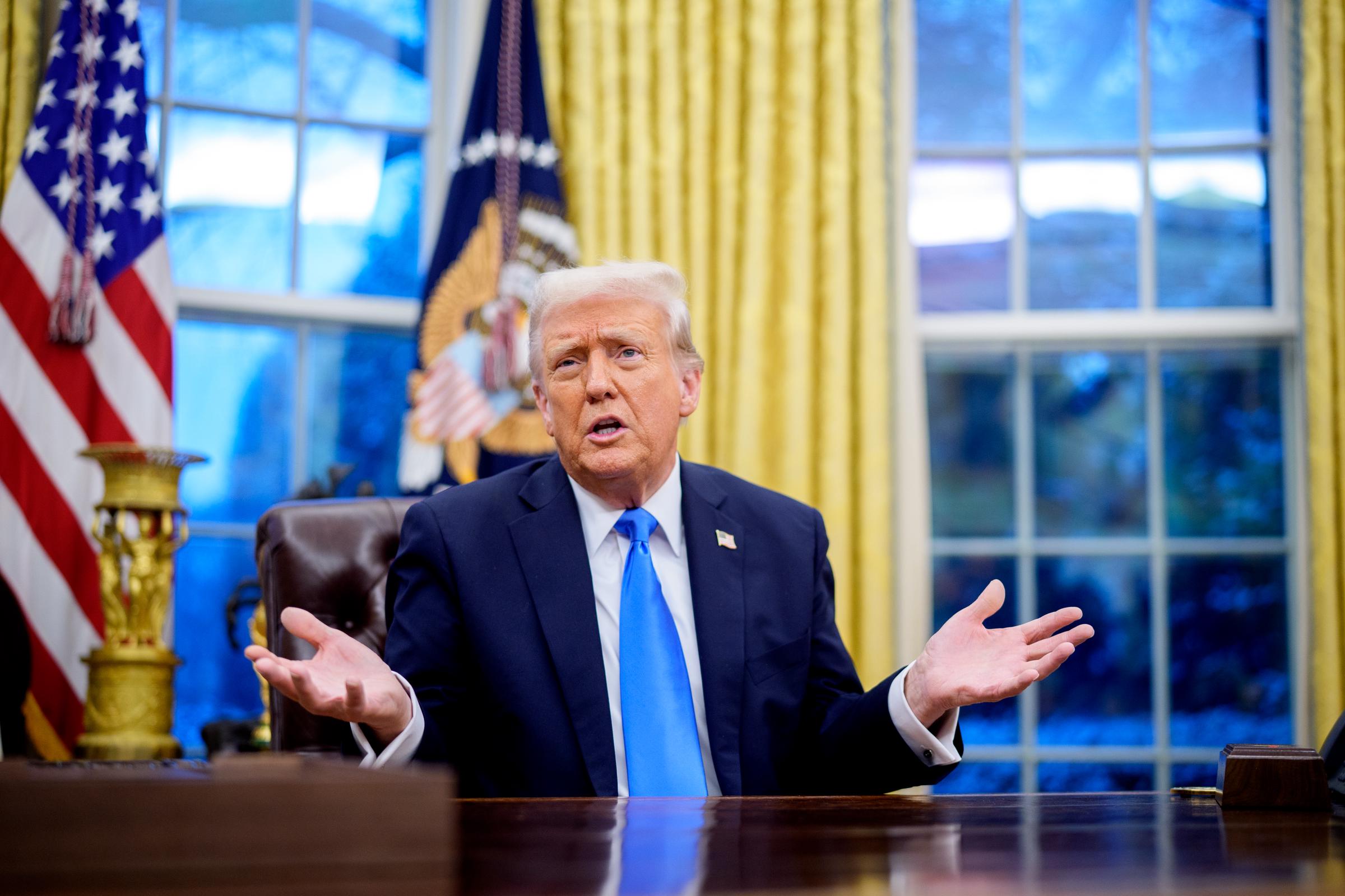 U.S. President Donald Trump speaks during an executive order signing in the Oval Office at the White House on February 11, 2025, in Washington, DC | Source: Getty Images