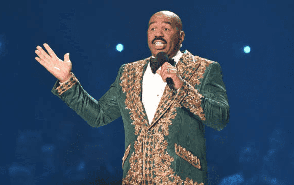 Steve Harvey speaks onstage while hosting the 2019 Miss Universe Pageant, at Tyler Perry Studios, on December 08, 2019 in Atlanta, Georgia | Source: Paras Griffin/Getty Images