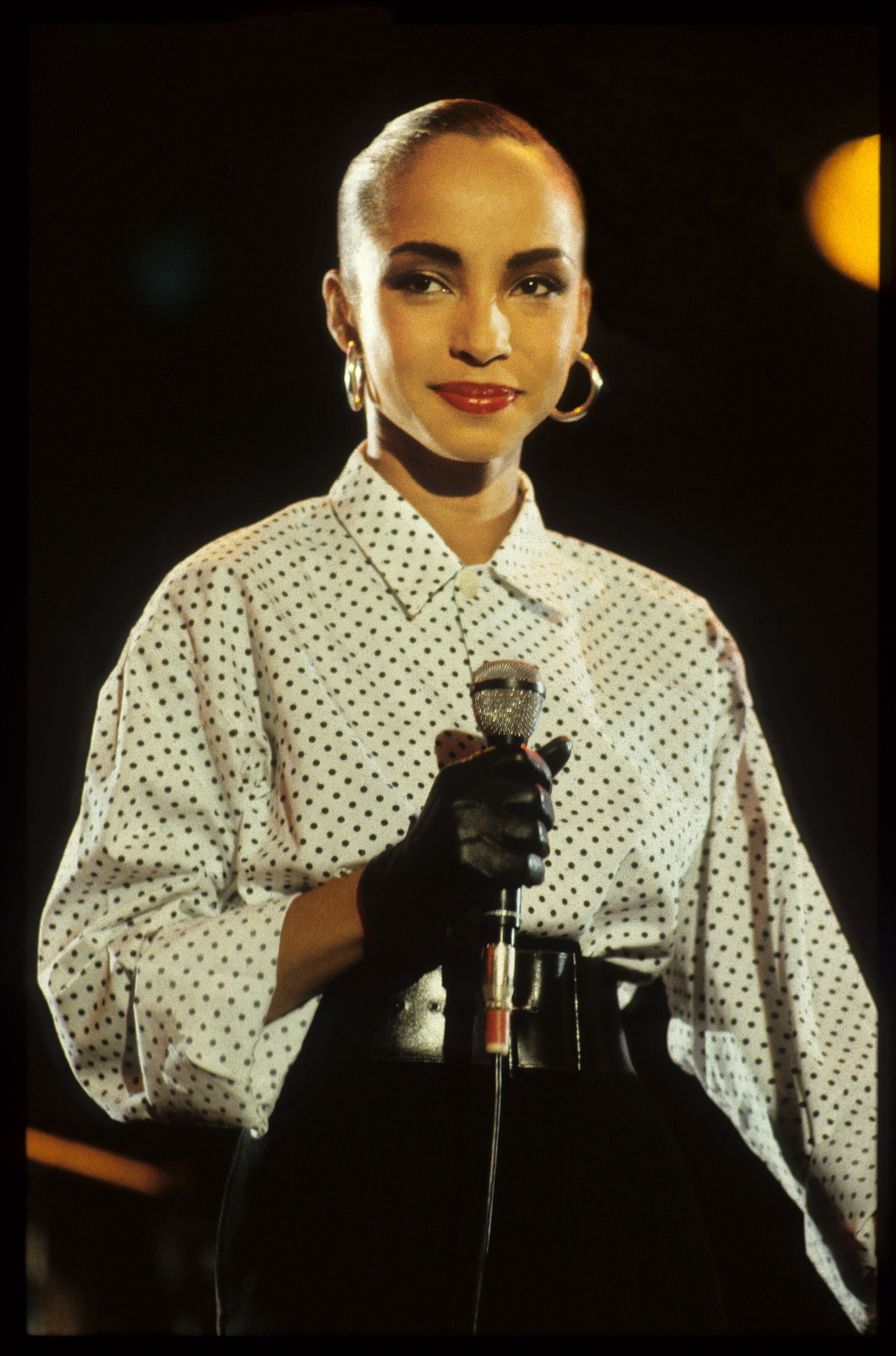 Sade performs on stage at Veronica Rocknight, Ahoy, Rotterdam, Netherlands, 21st September 1984 | Photo: Getty Images