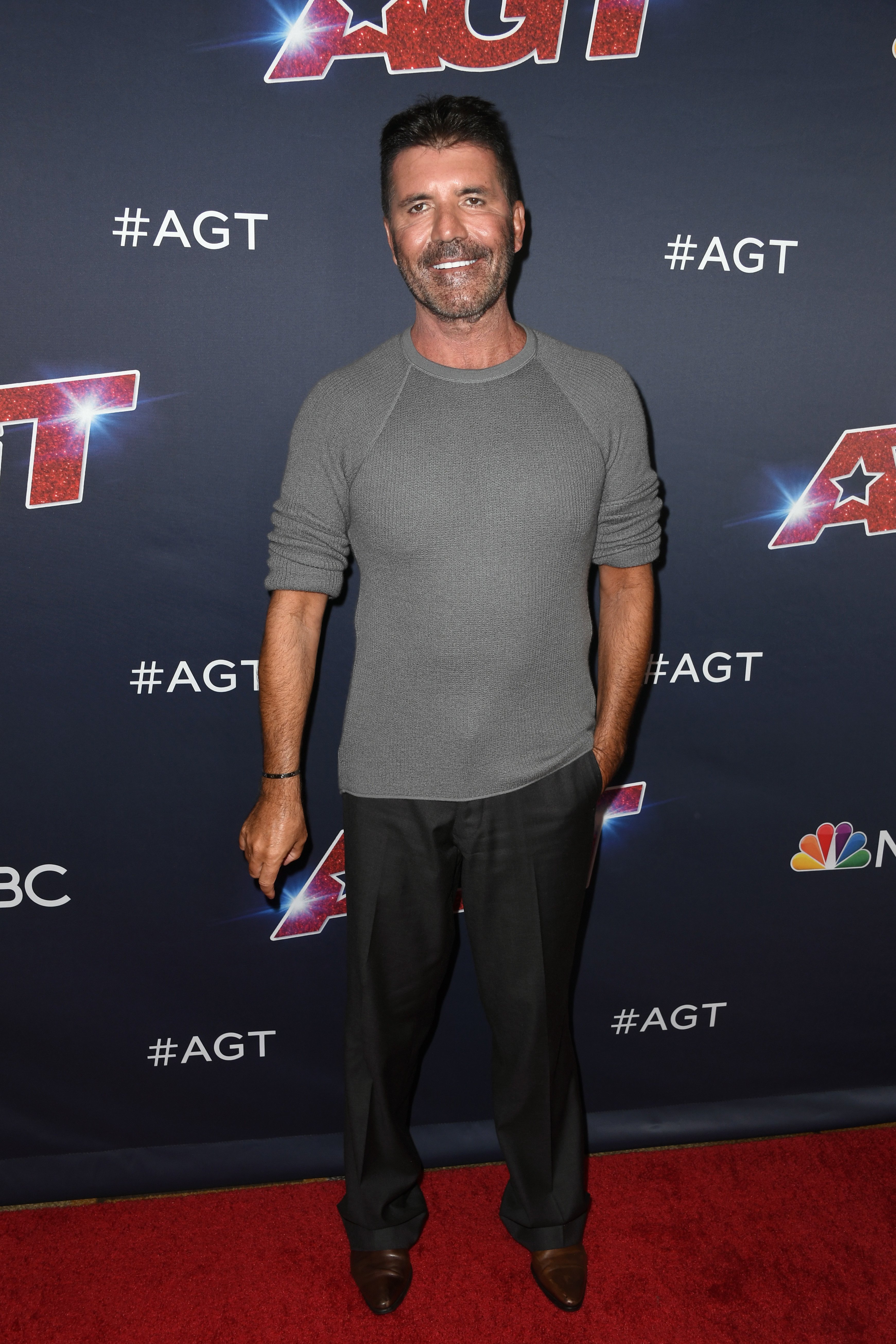 Simon Cowell at the "America's Got Talent" Season 14 Live Show at Dolby Theatre on August 13, 2019 in Hollywood, California | Photo: Getty Images