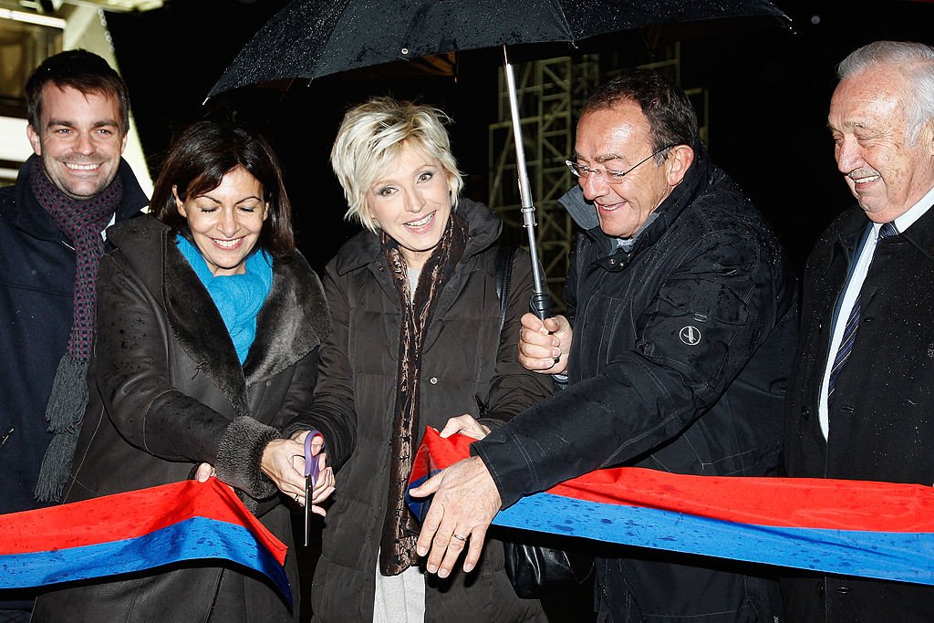 Évelyne Dhéliat and Jean-Pierre Pernaut. l Source: Getty Images