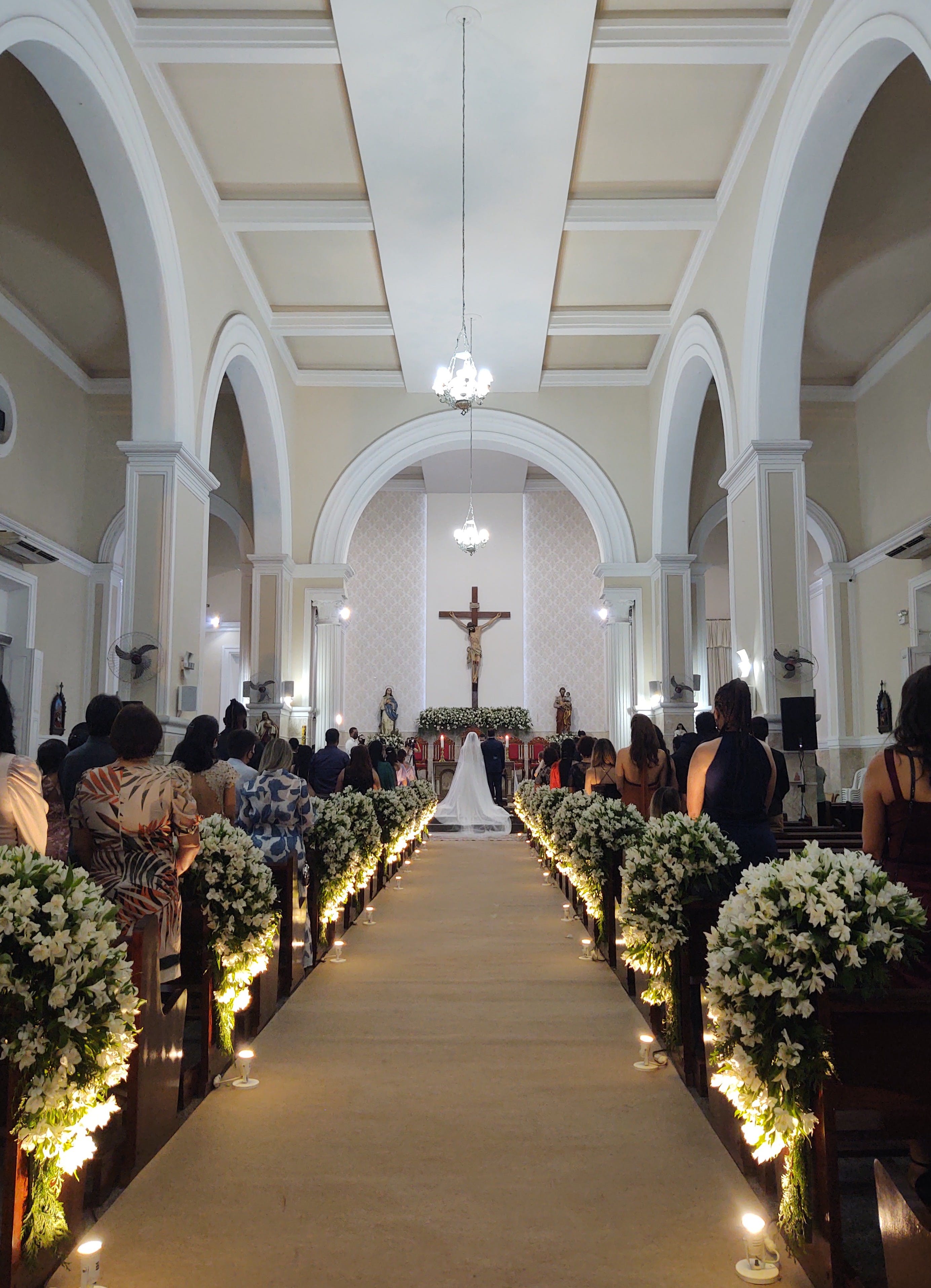 A church decorated for a wedding day event while filled with people | Source: Pexels