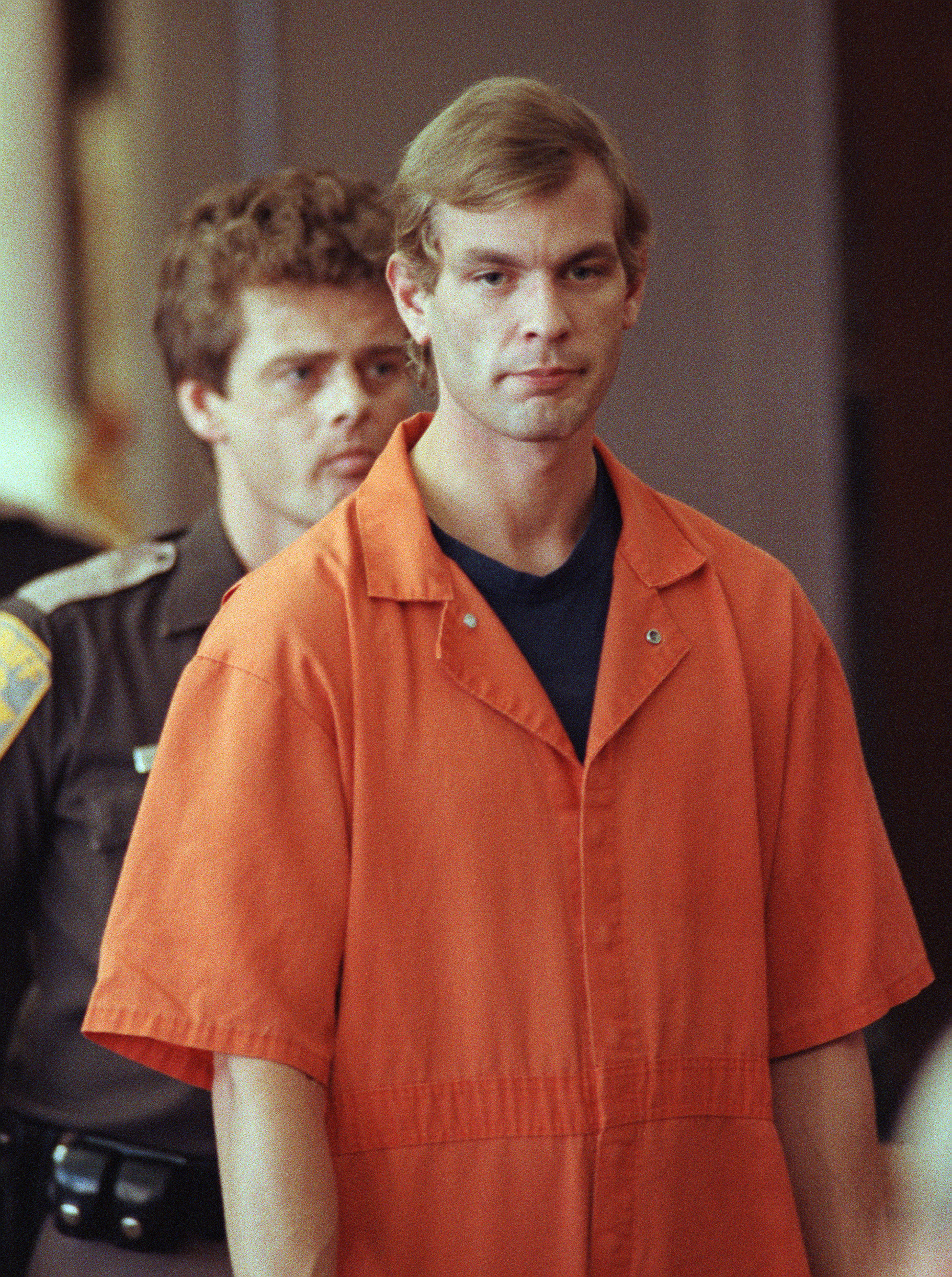 Jeffrey Dahmer entering a courtroom on August 6,1991. | Source: Getty Images