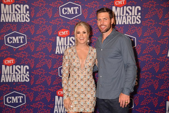 Carrie Underwood and Mike Fisher at the 2019 CMT Music Awards on June 05, 2019 | Photo: Getty Images