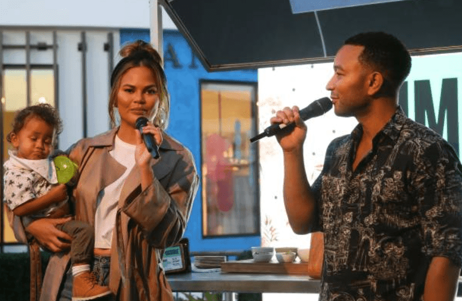 Miles Stephens, Chrissy Teigen and John Legend speak at an audience at the Impossible Foods Grocery Los Angeles Launch with "Pepper Thai" Teigen, on September 19, 2019 in Los Angeles, California | Source: Getty Images z(Photo by Amanda Edwards/WireImage)