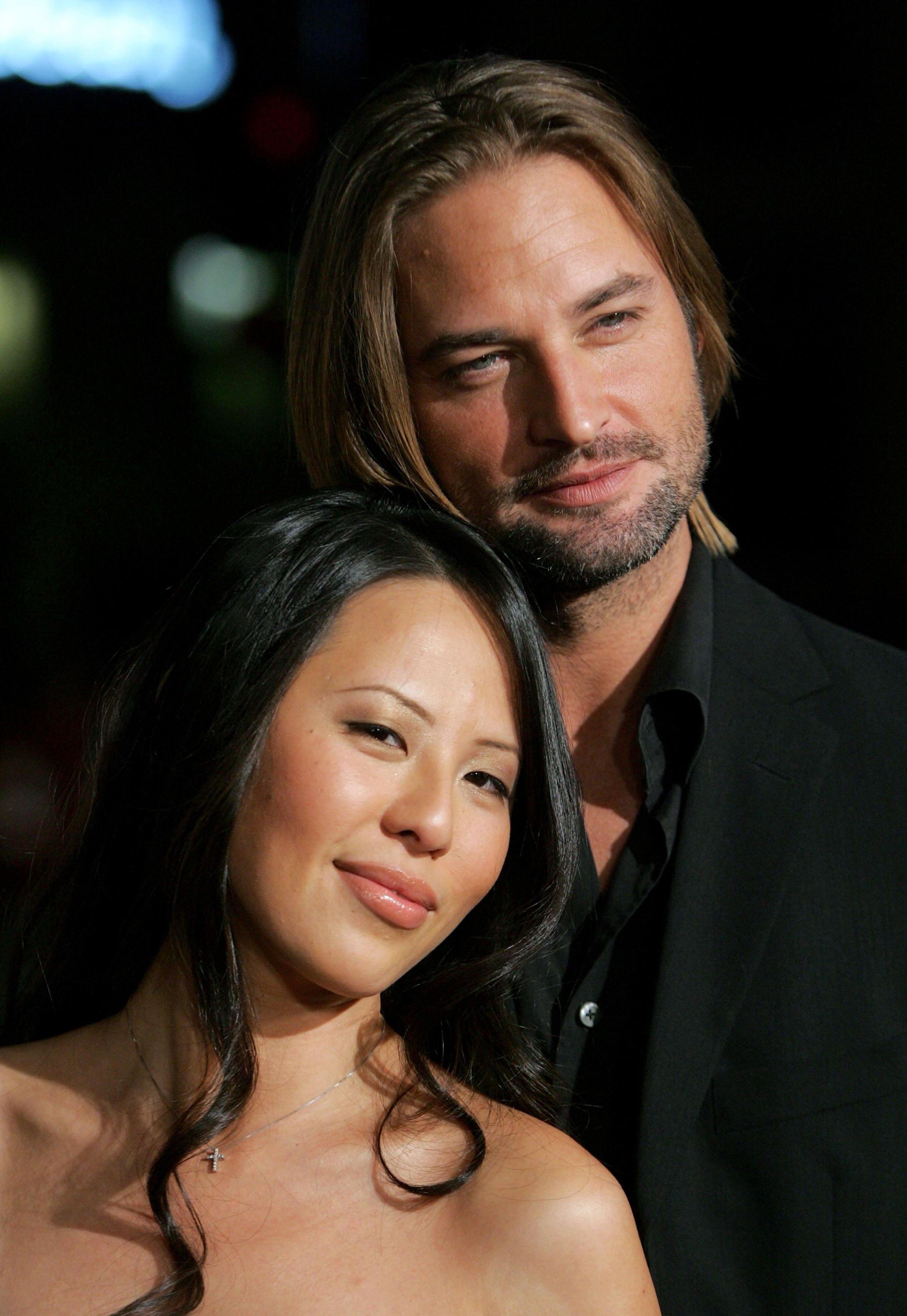 Yessica Kumala and Josh Holloway at the premiere of "We Are Marshall" on December 14, 2006, in Hollywood, California | Source: Getty Images