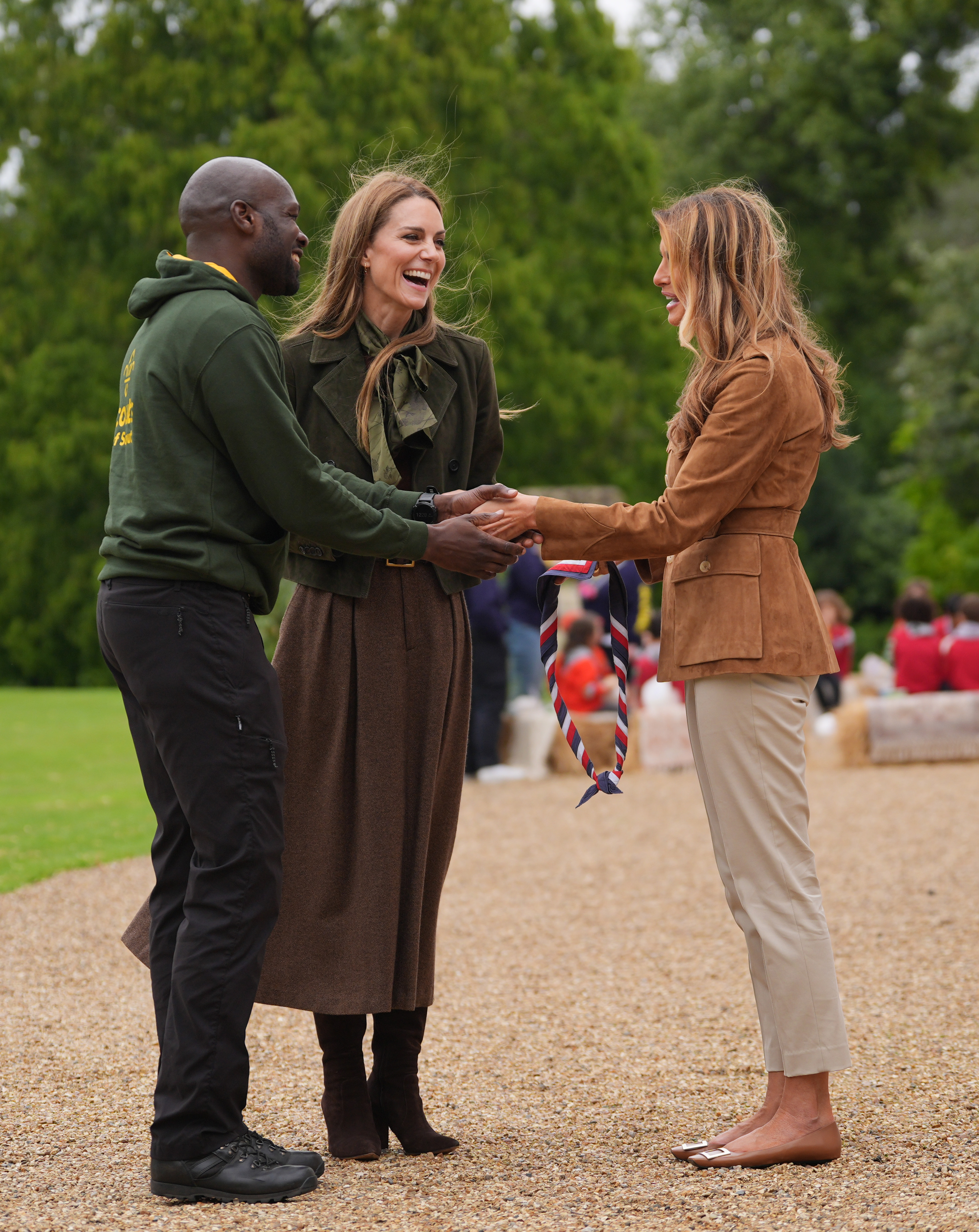 Princess Kate and First Lady Melania Trump talk to the Chief Scout for the Scout Association, Dwayne Fields, on September 18, 2025 | Source: Getty Images