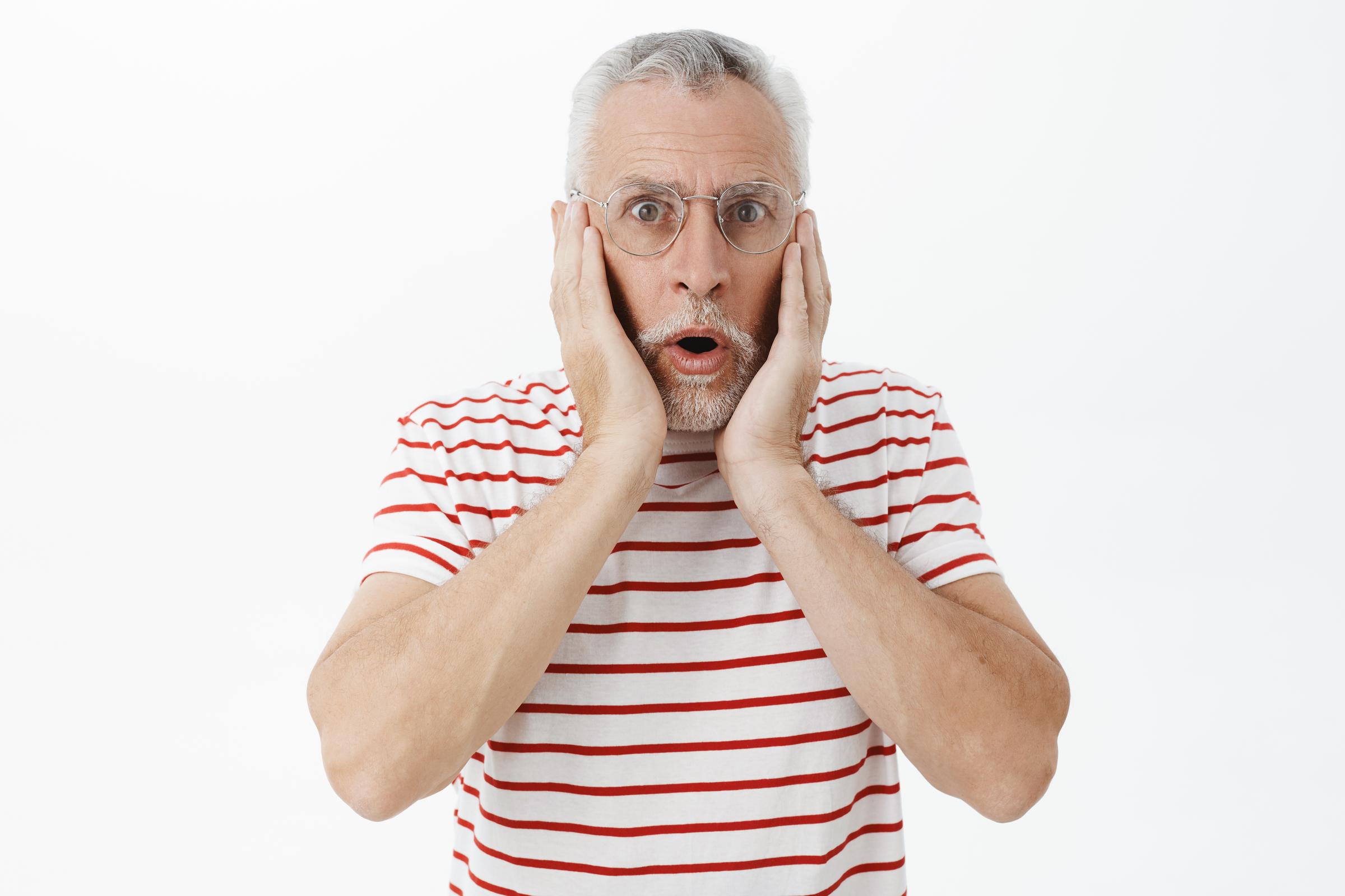 A shocked middle-aged man | Source: Freepik