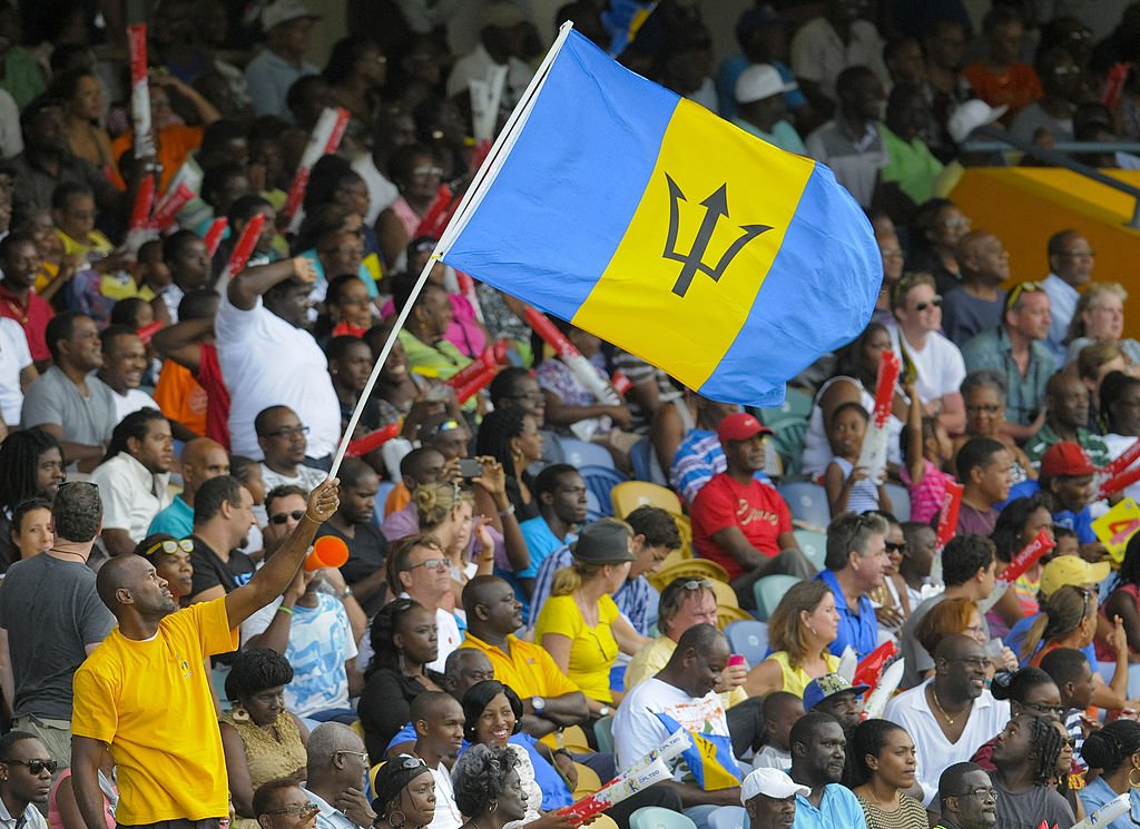 Fans wave the Barbados flag during a match between Barbados Tridents and Antigua Hawksbills at Kensington Oval on July 25, 2014 in Bridgetown, Barbados. | Photo: Getty Images.