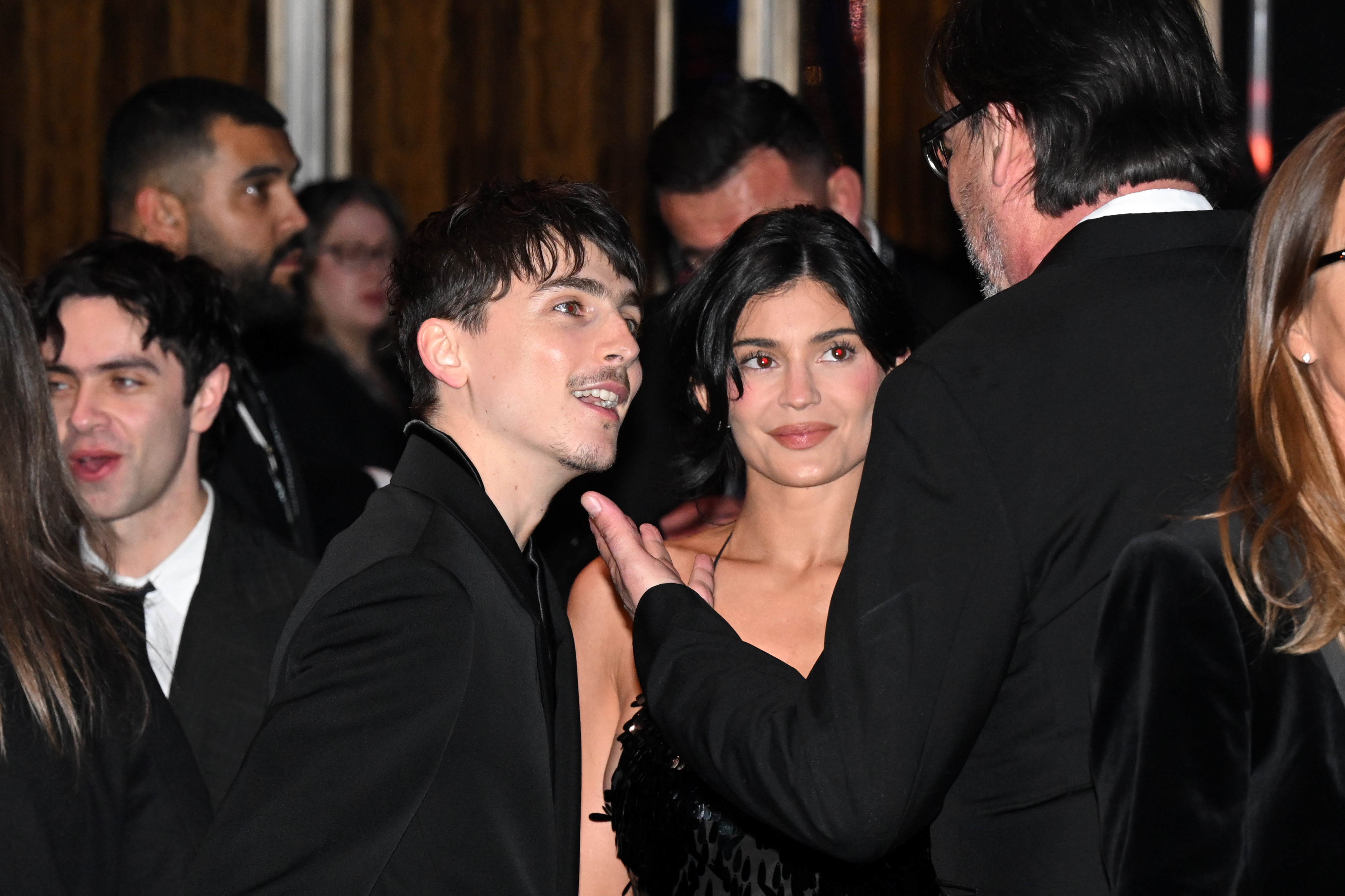 Timothée Chalamet and Kylie Jenner conversing with other guests during the EE BAFTA Film Awards 2025 | Source: Getty Images