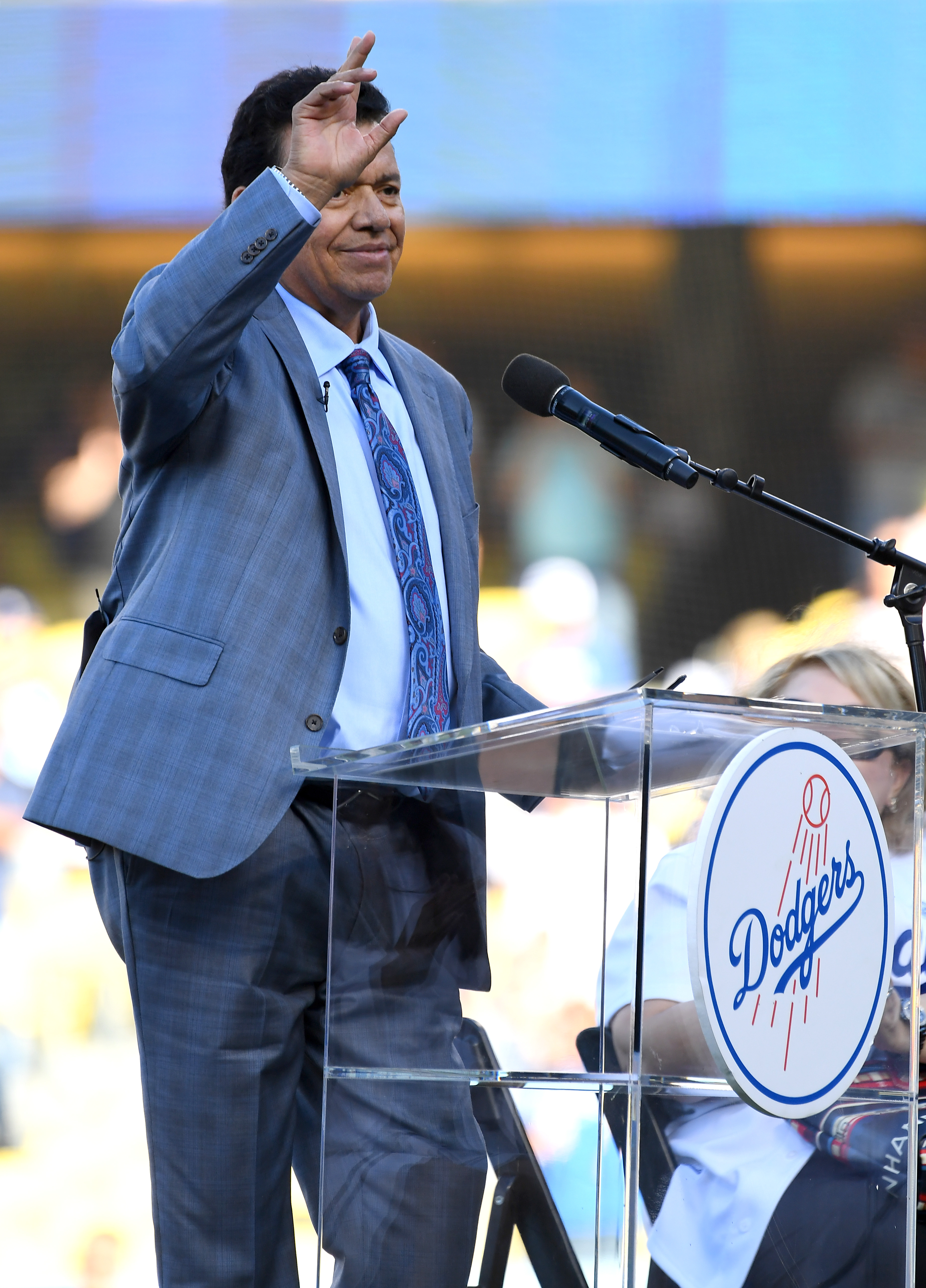 Fernando Valenzuela speaks to the crowd during a Legends of Dodger Baseball pre-game ceremony at Dodger Stadium on July 20, 2019 | Source: Getty Images.