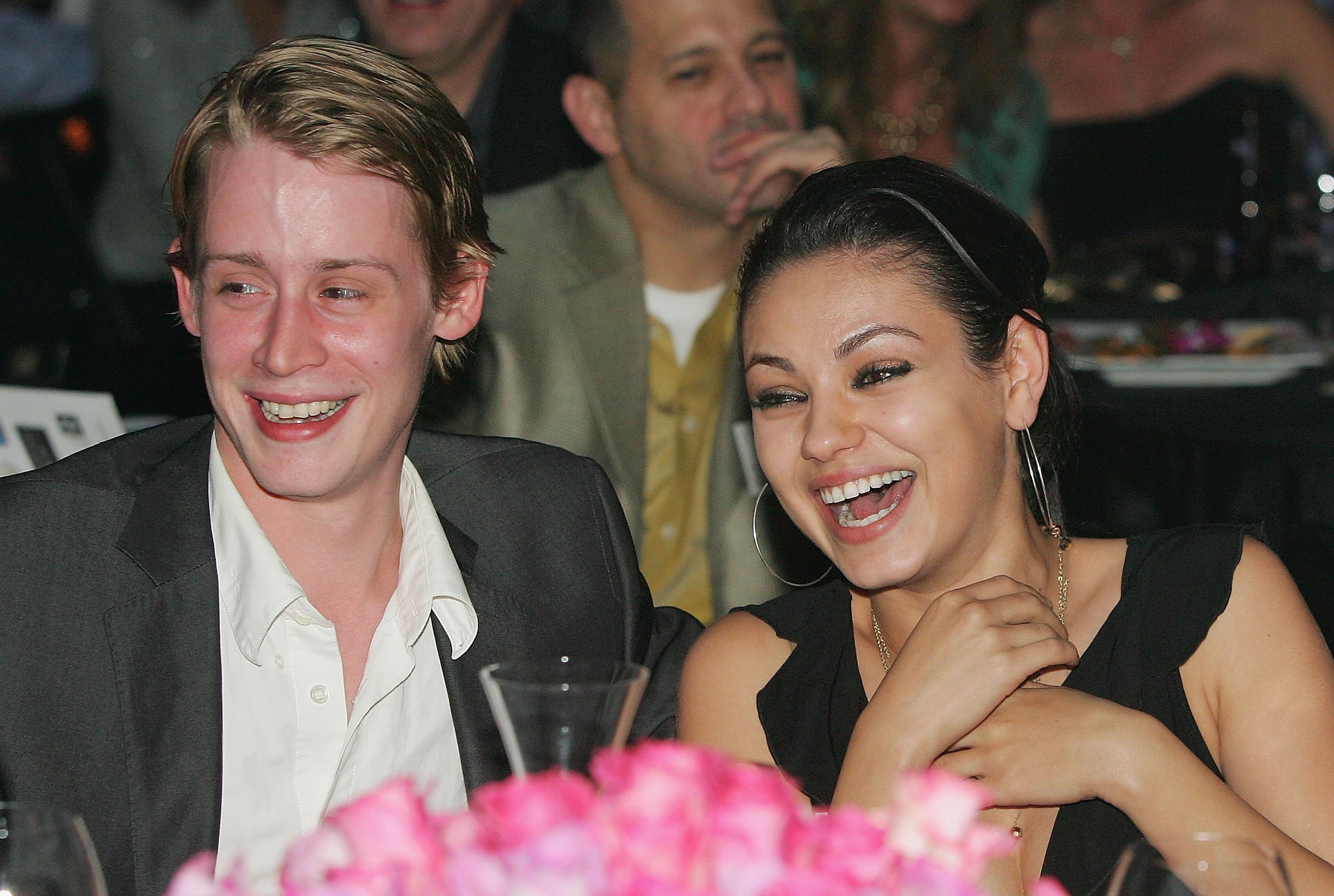 Macaulay Culkin and Mila Kunis at the launch of the "uBid for Hurricane Relief" on October 15, 2005 | Source: Getty Images