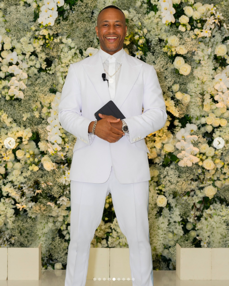 Reverend Devon Franklin posing for a picture on LeToya Luckett and Taleo Coles' wedding day, posted on August 1, 2024 | Source: Instagram/devonfranklin