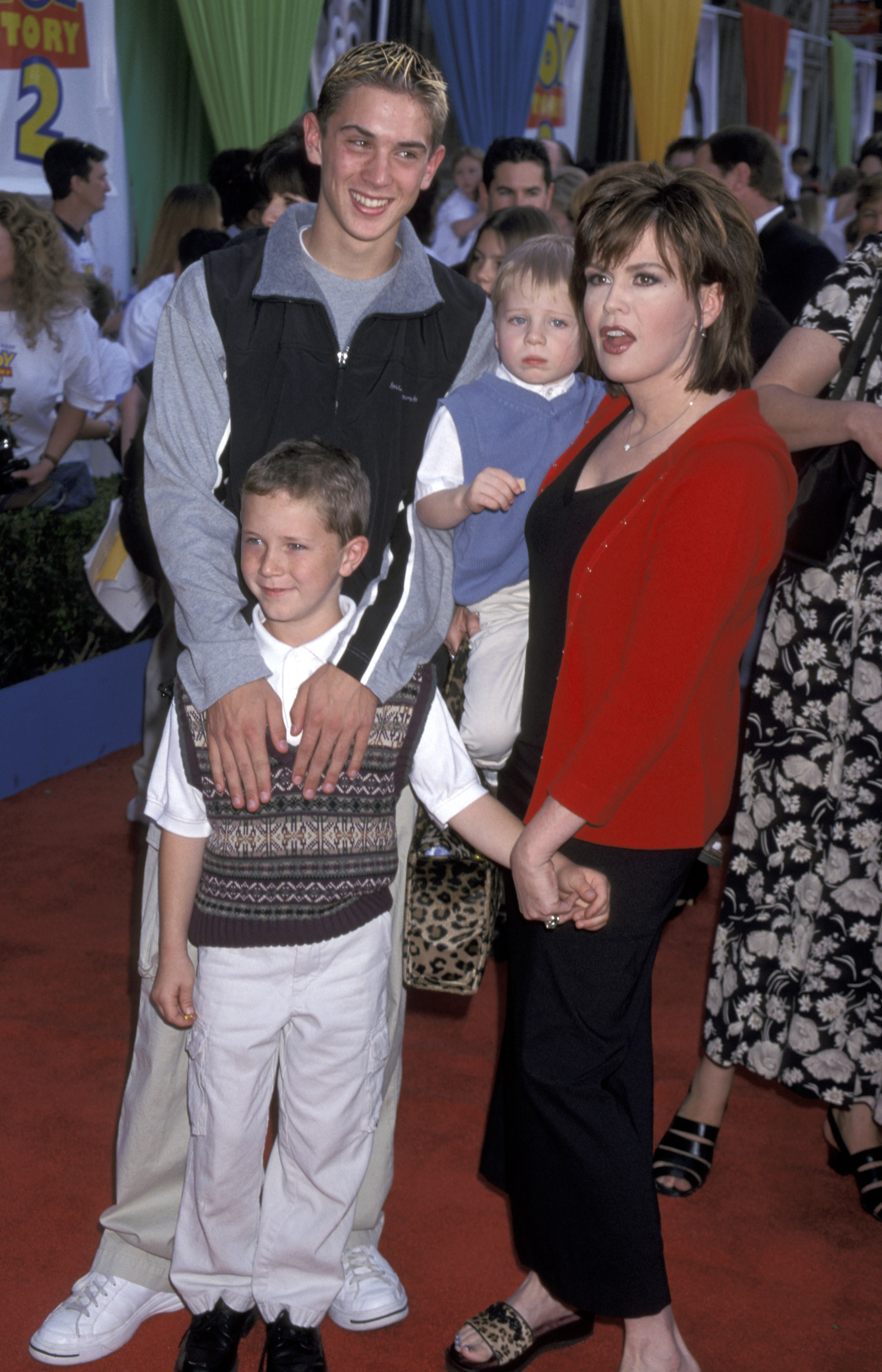 Marie Osmond with her sons, Stephen, Michael, and Brandon, at the world premiere of "Toy Story 2" in 1999. | Source: Getty Images