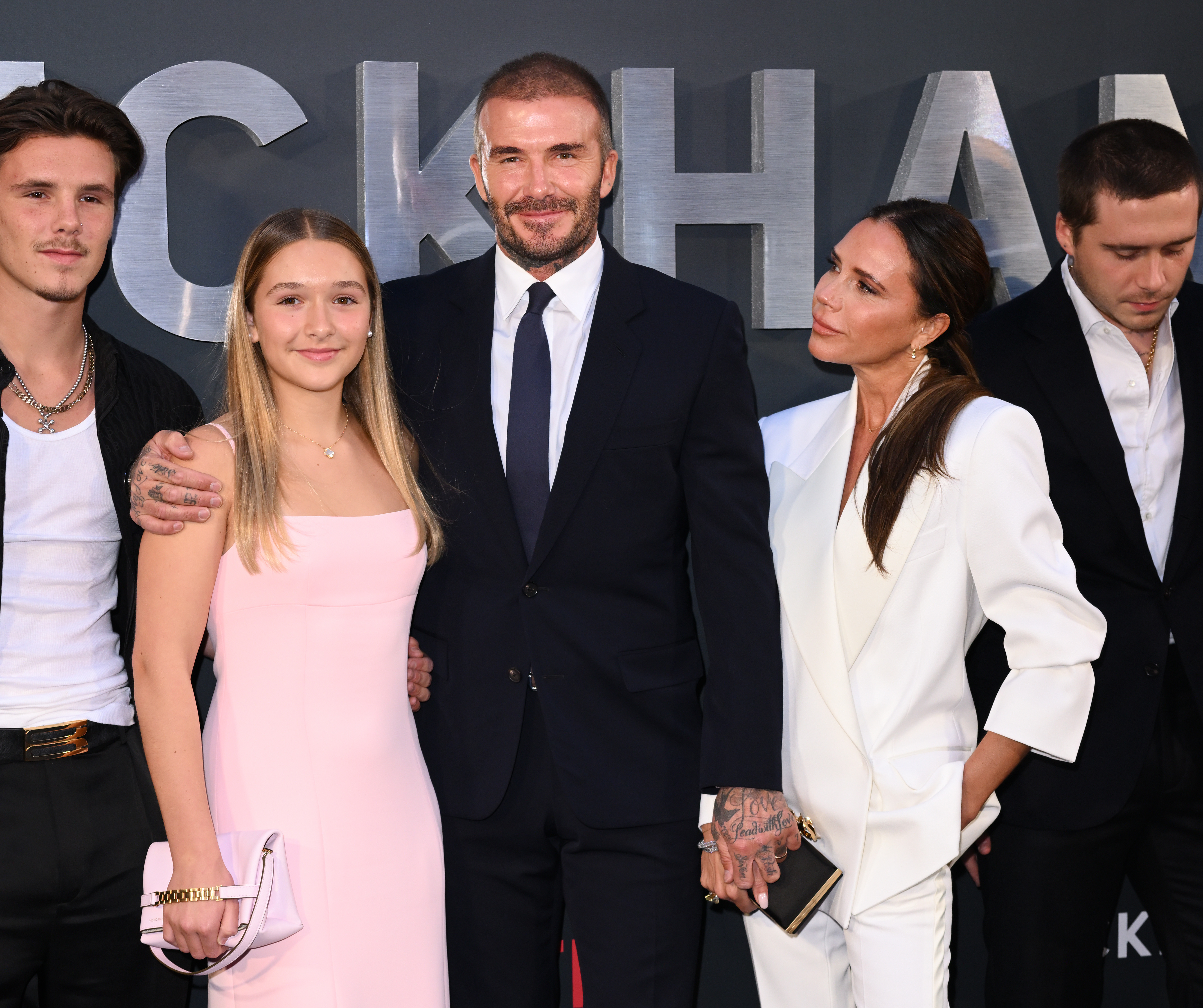 Harper Beckham, David Beckham and Victoria Beckham attend the Netflix 'Beckham' UK Premiere at The Curzon Mayfair on October 3, 2023, in London, England. | Source: Getty Images